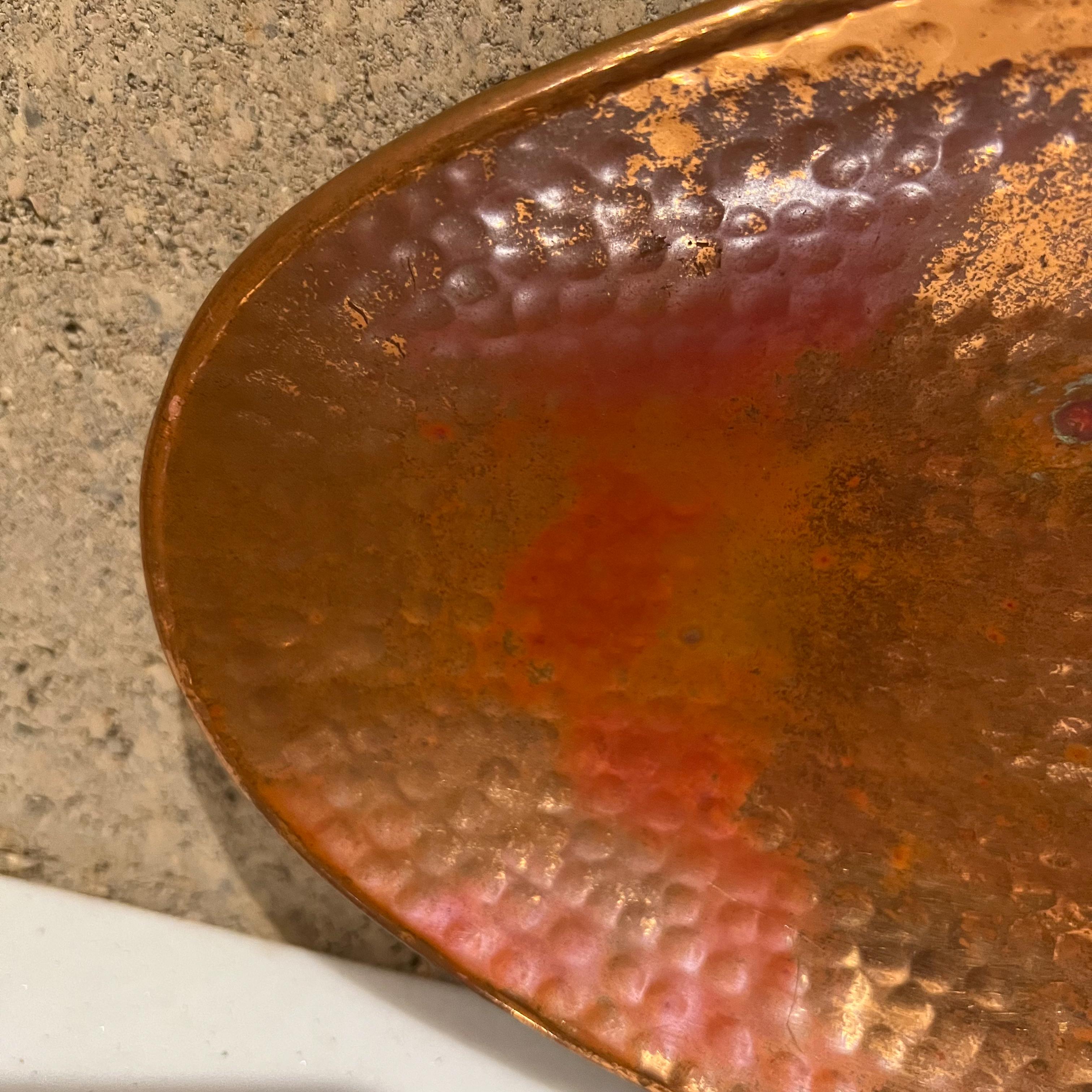 1970s vintage Modern hammered copper dish tray platter oval design
Bread Cheese serving dish
Measures: 1.63 tall x 7.38 depth x 20 width
Preowned unrestored vintage condition.
See images please.
   
