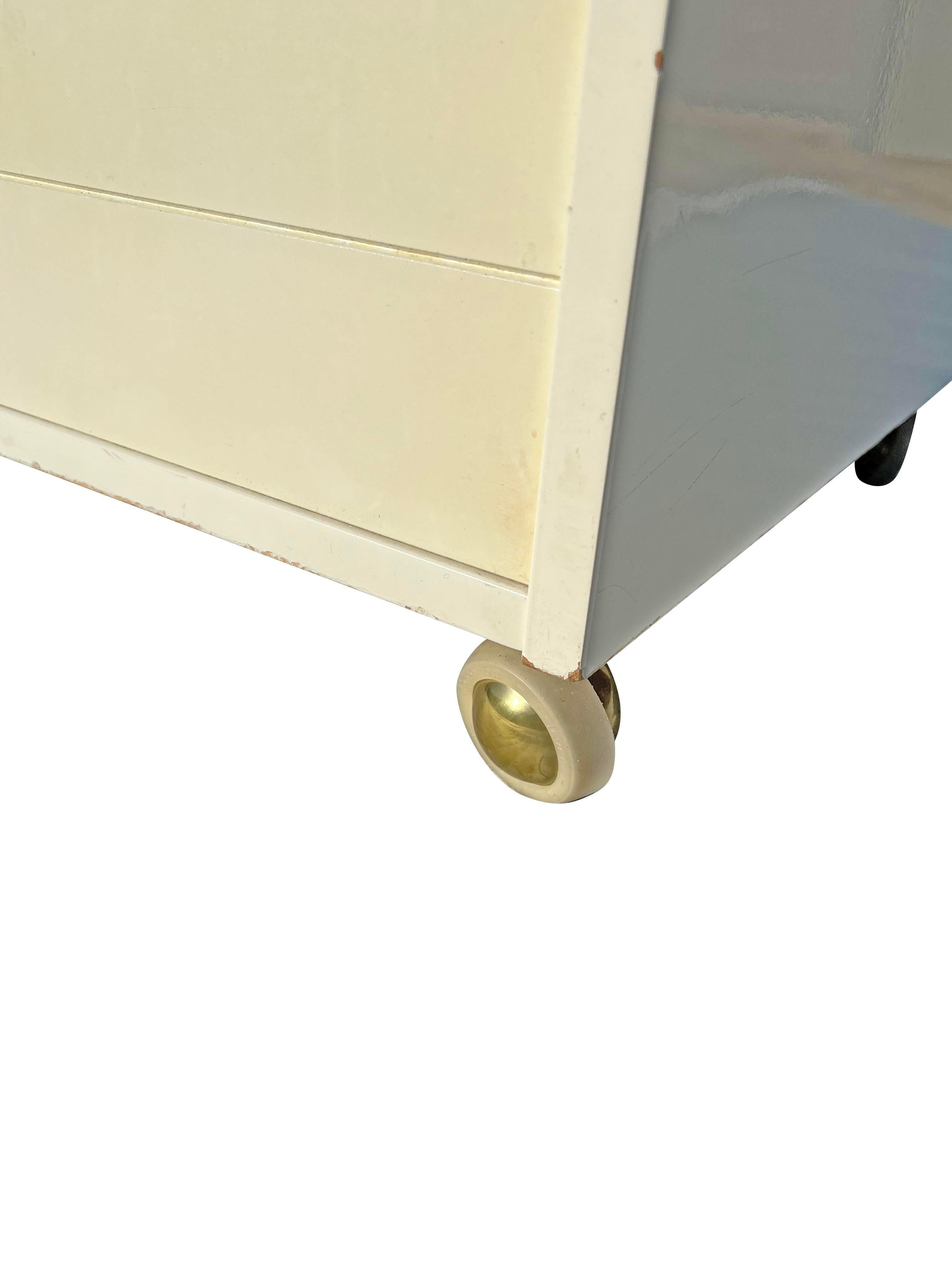 1970s Vintage Modern White Nightstands With Brass Hardware on Wheels - a Pair For Sale 1