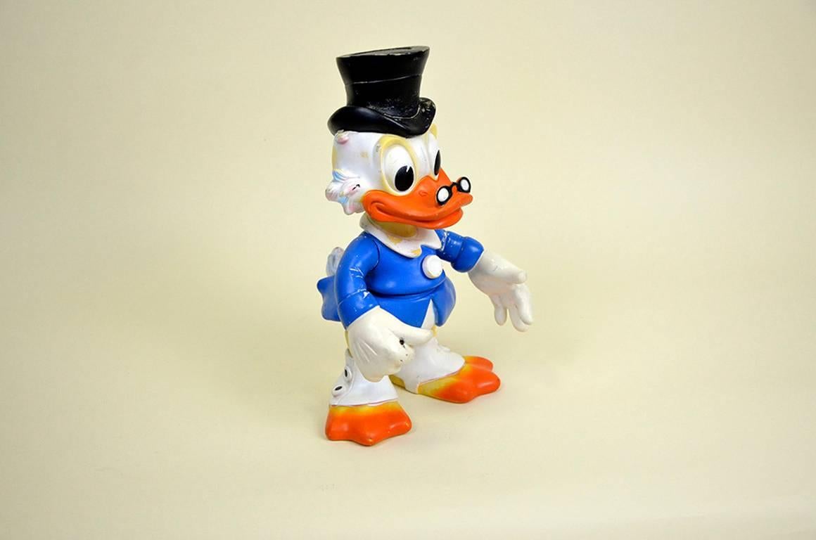 Vintage Uncle Scrooge squeak rubber toy made by Ledraplastic Italy in the 1970s.

Marked Walt Disney Production on the back and stamped with Ledraplastic elephant symbol.

Collector's note:

In 1962, the company Ledraplastic started to make