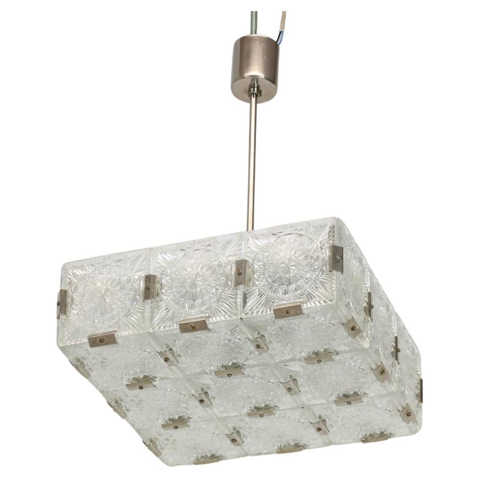 1970s vintage pendant by Kamenicky Senov, made in former Czechoslovakia.
Made of chrome and glass.
Repolished, cleaned, shows some minor signs of use.
Fully functional.