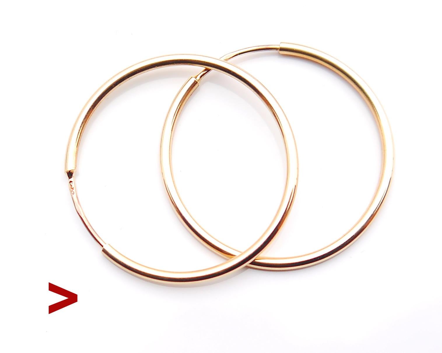 A pair of Creole Hoops in solid 14K Rose Gold was made and purchased in Socialist Poland in the 1970s. Note that this model does not suggest any internal springs or folding parts. Ends just pull out of the tubes to open and ends get back when