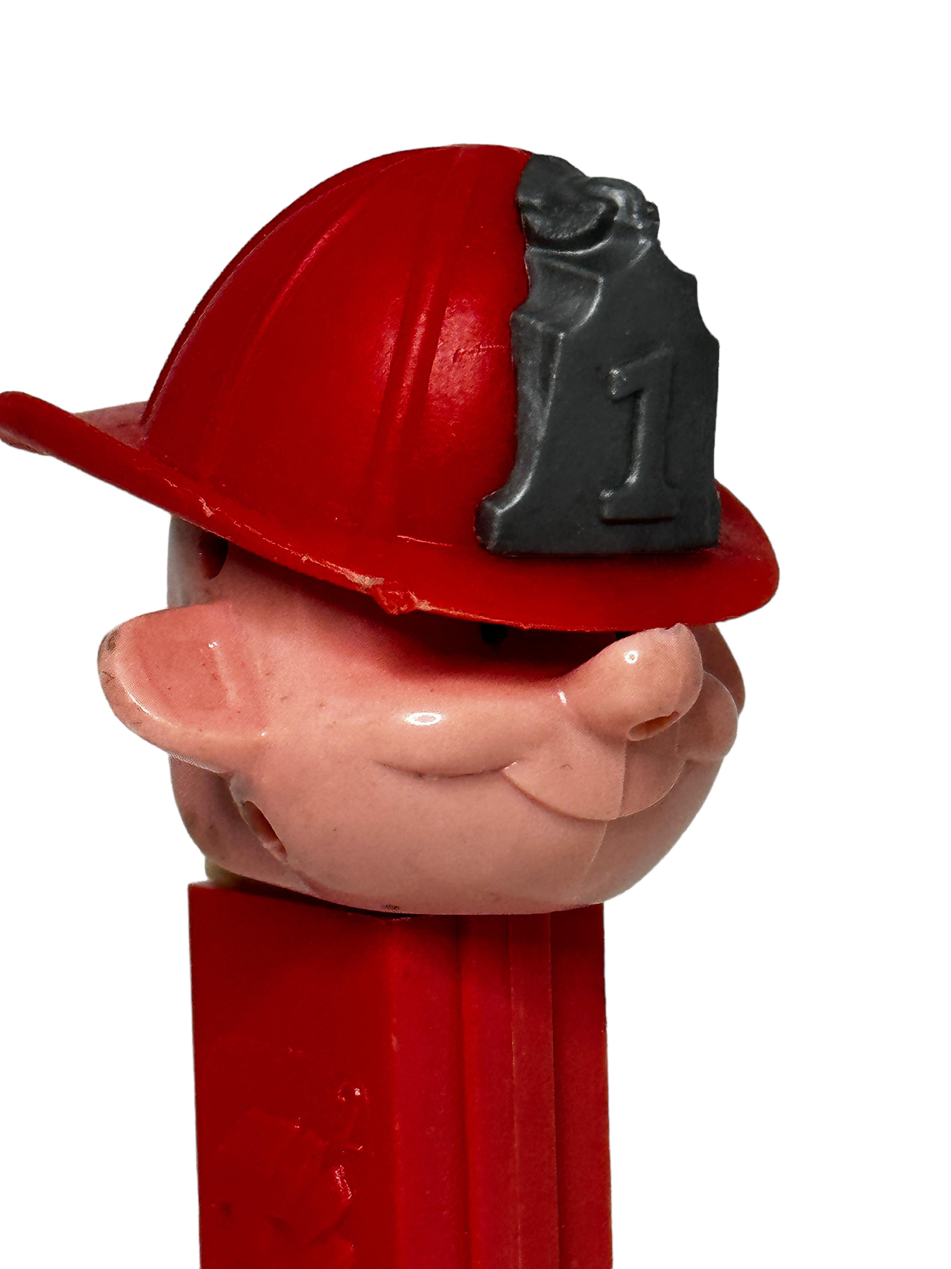 Plastic 1970s Vintage Red Pez Fireman Candy Dispenser U.S, Pat. 3.410.455 No Feet For Sale