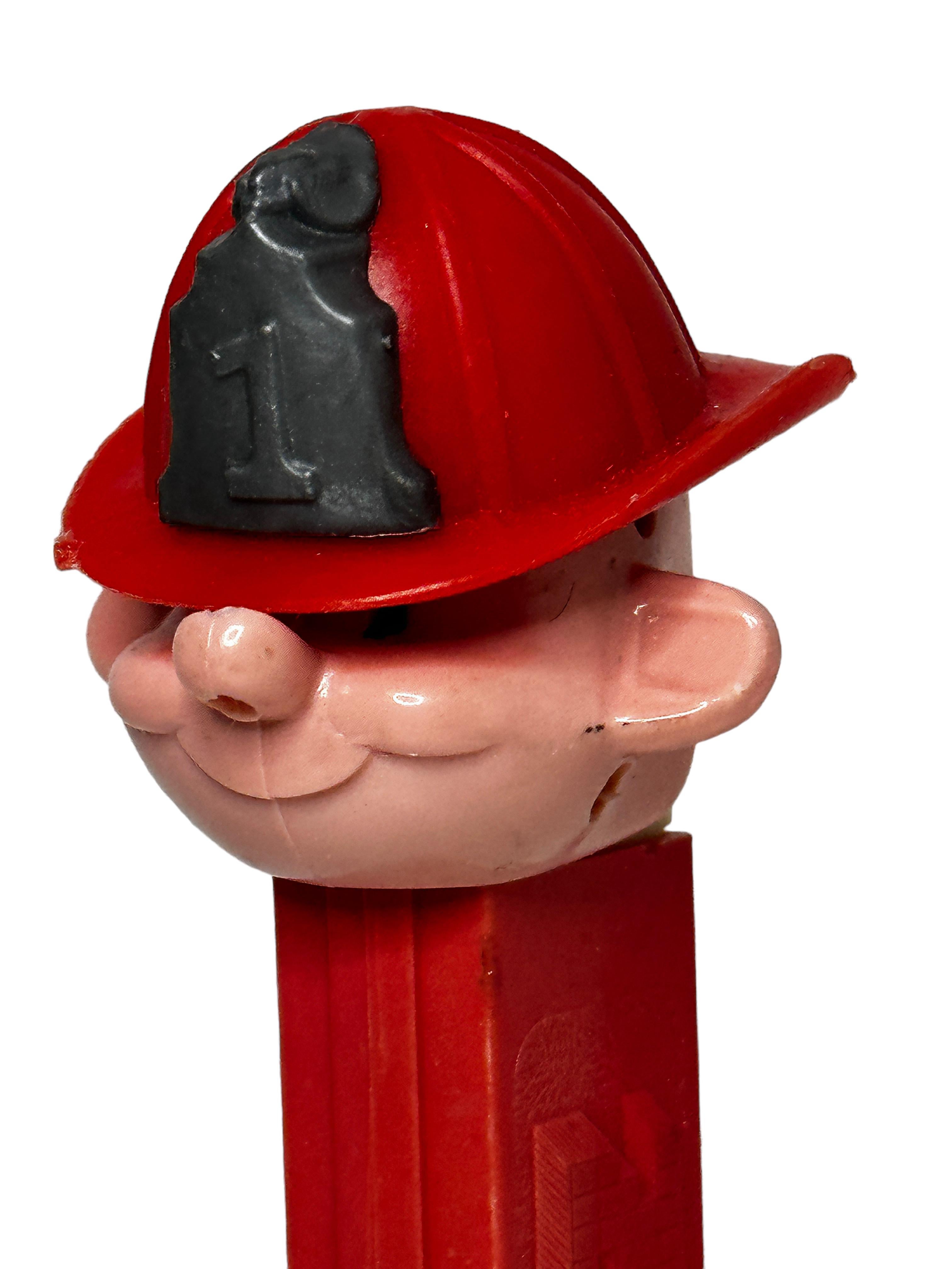 Late 20th Century 1970s Vintage Red Pez Fireman Candy Dispenser U.S, Pat. 3.410.455 No Feet For Sale