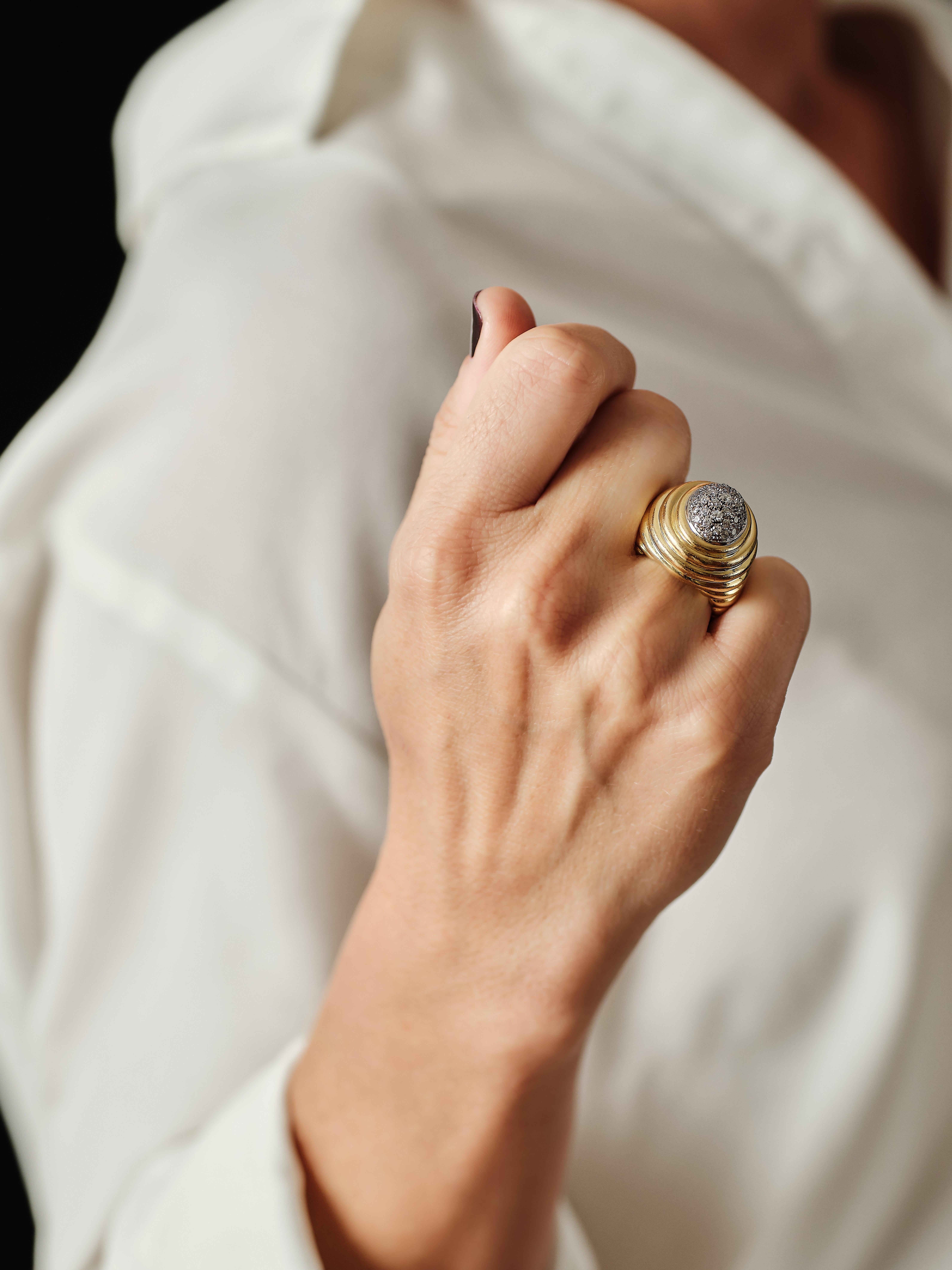 Fun and voluminous cocktail ring. A big daring piece. 
Steady gold design topped with estimated approx 0.75ct diamonds. Because of the setting the carat weight is an calculated estimation. 

It is numbered and hall mark with an owl for french import