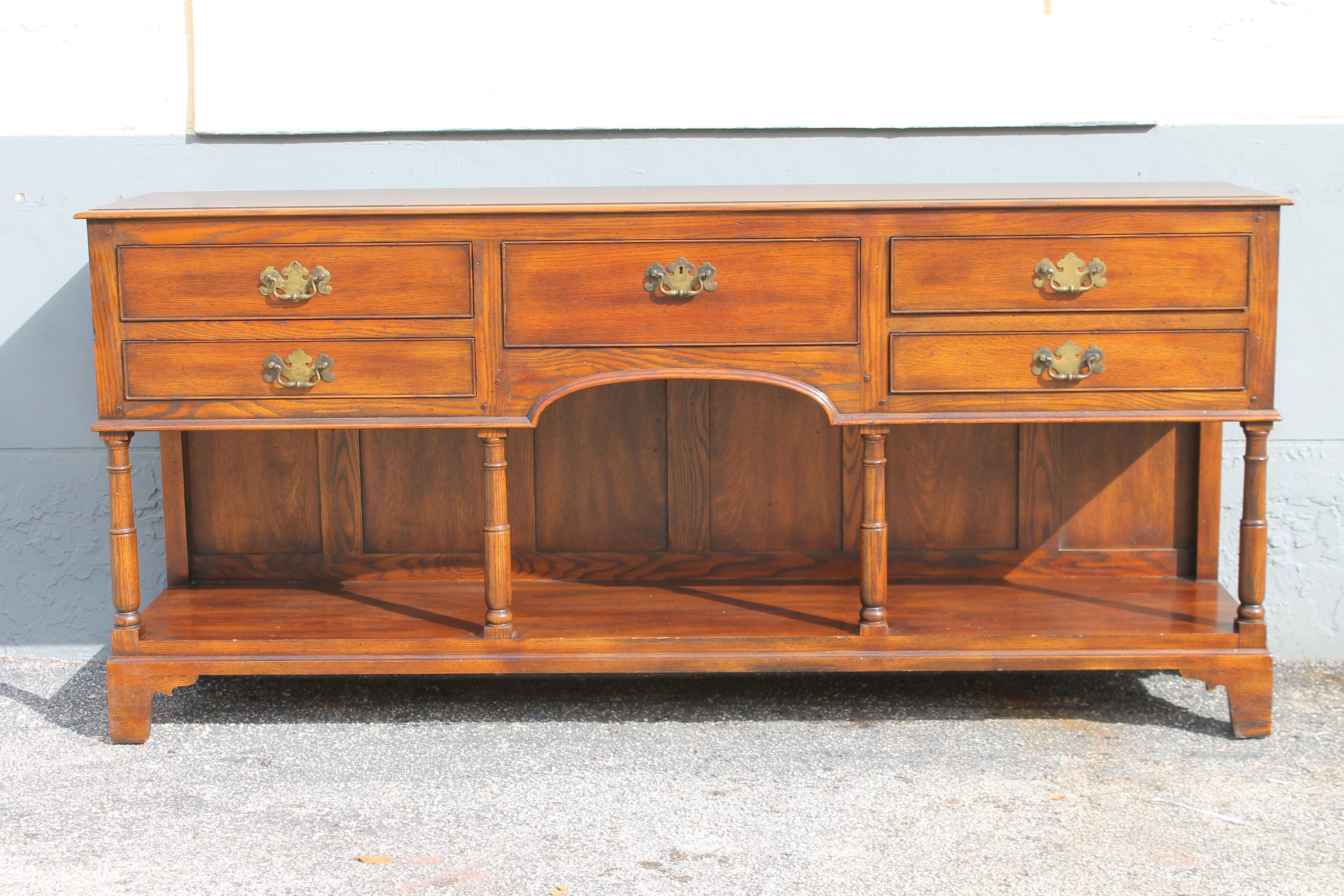 Beautiful Vintage 1970's Buffet/ Sideboard/ Credenza Signed by John Widdicomb. This buffet commands presence. There is much closed and open storage. Miami Beach Estate Purchase.