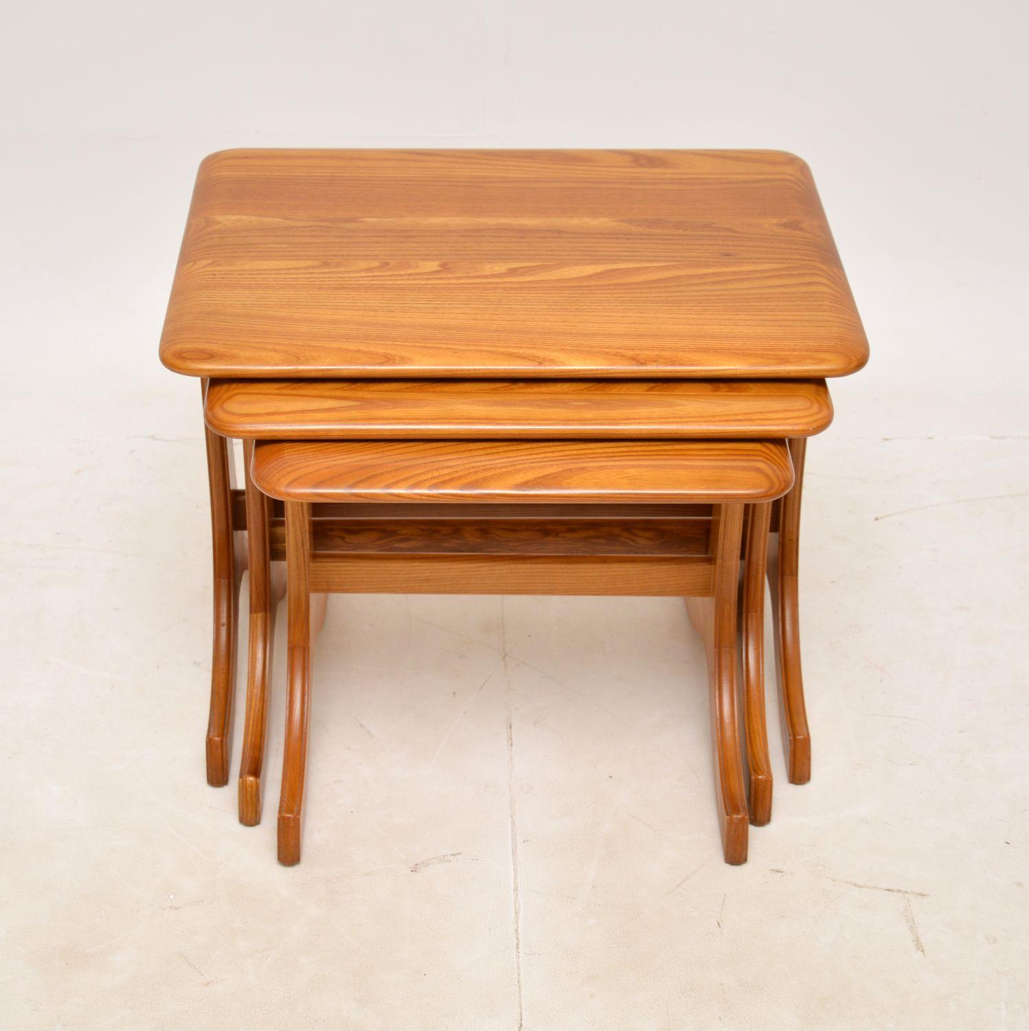 A beautifully constructed nest of three solid elm nesting tables. They were made in England, and they date from around the 1970s.
The quality is amazing, they are very well made from solid elm which has some gorgeous grain patterns. They are a