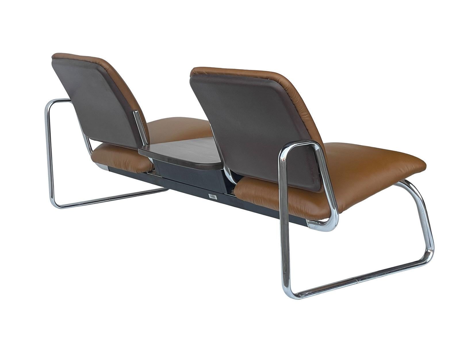 Super cool Steelcase bench reupholstered with authentic Herman Miller leather from DWR.
