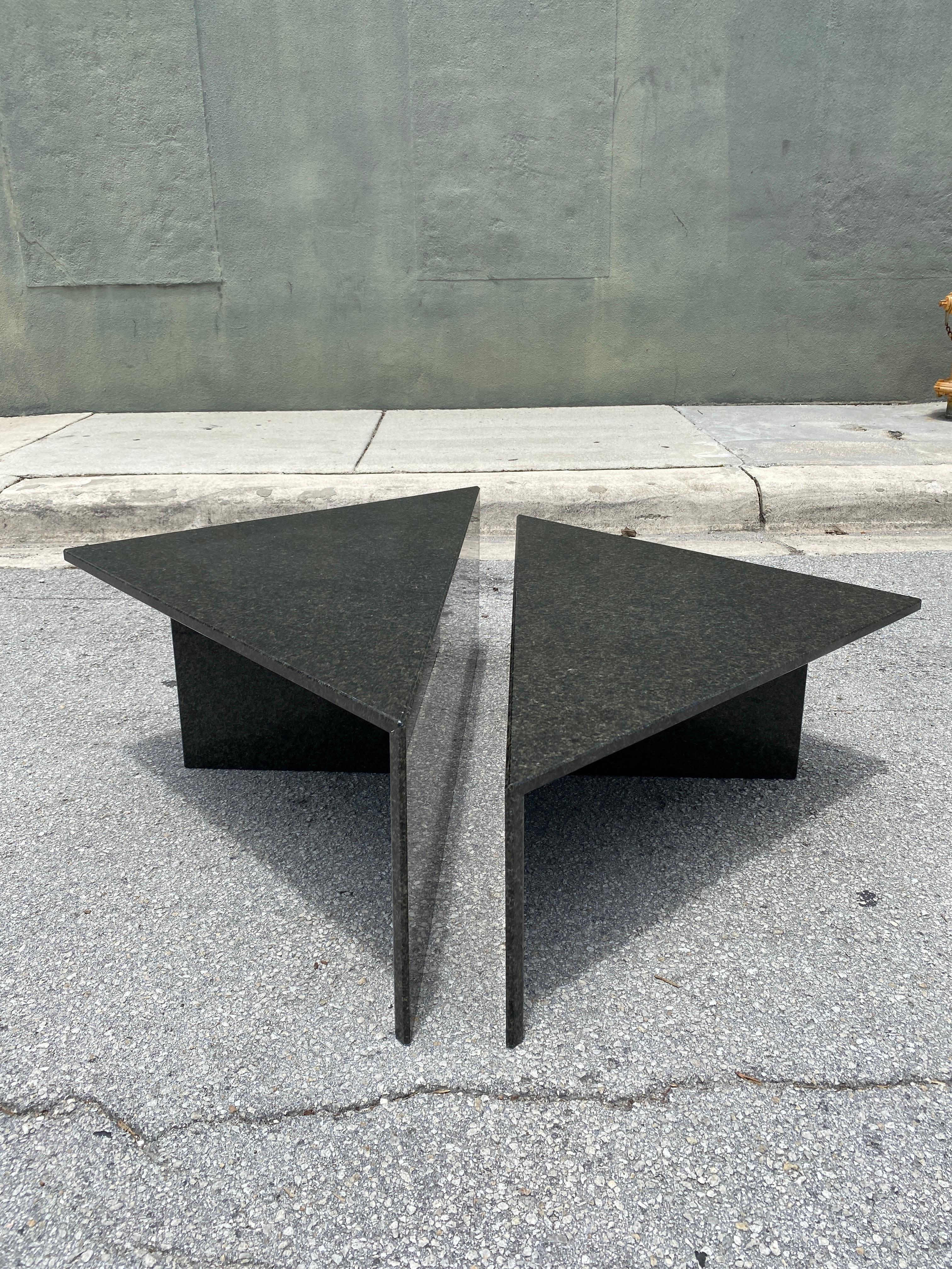 Classic post modern tiered Italian black Granite coffee piece comprised of 2 triangular shape tables of different heights, they can be configured in any manner to form a square or a rectangle. They can also be used as end tables.

Excellent