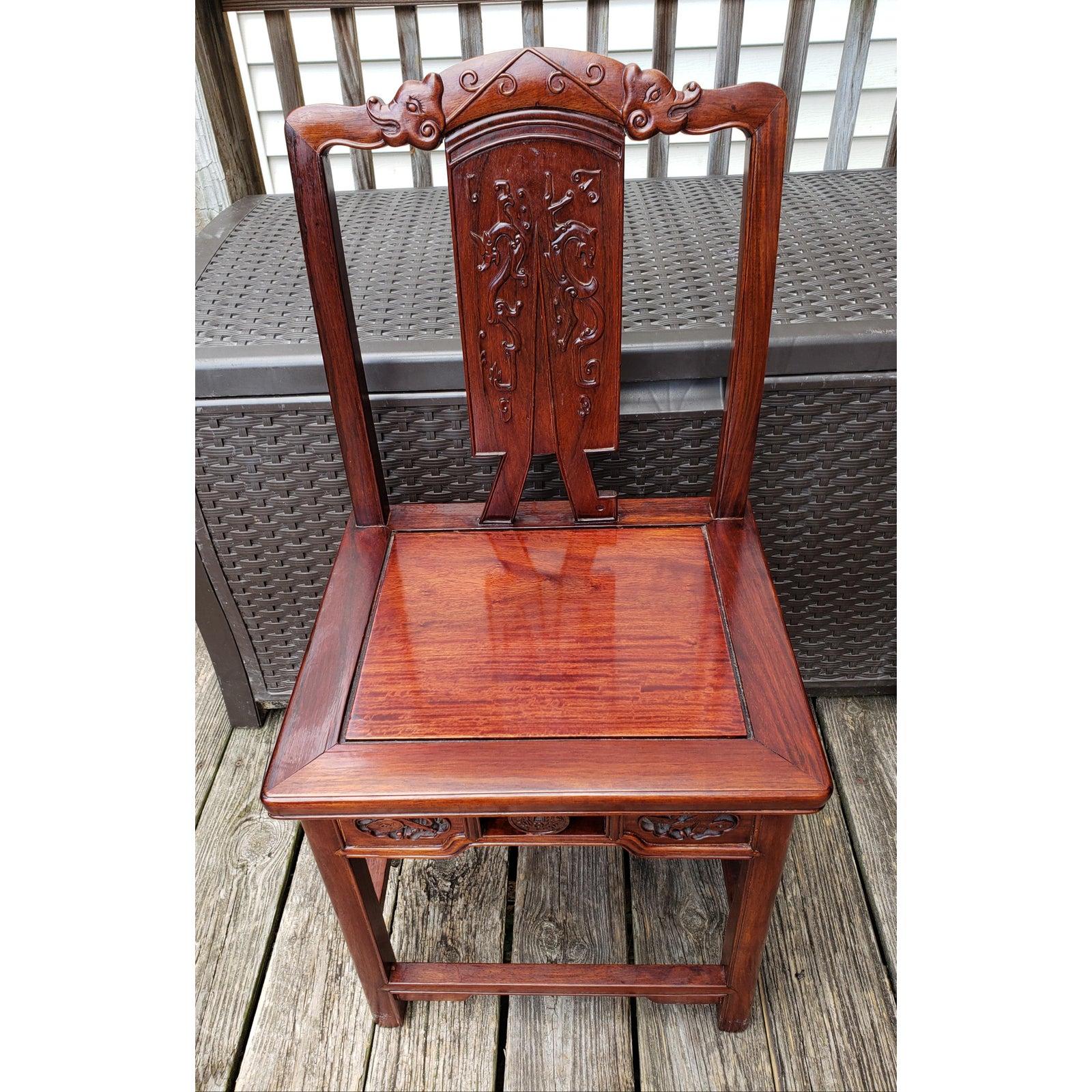 Pair of Traditional Chinese Antique hand carved solid rosewood chairs. Two Hand carved dragons on the back of each chairs additionally to amazing seat front carvings.
Chairs are in excellent condition and measure 18