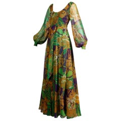 Maxikleid aus Chiffon mit transparenten Ärmeln und tropischem Vintage-Print aus den 1970er Jahren mit weit ausladendem Rock