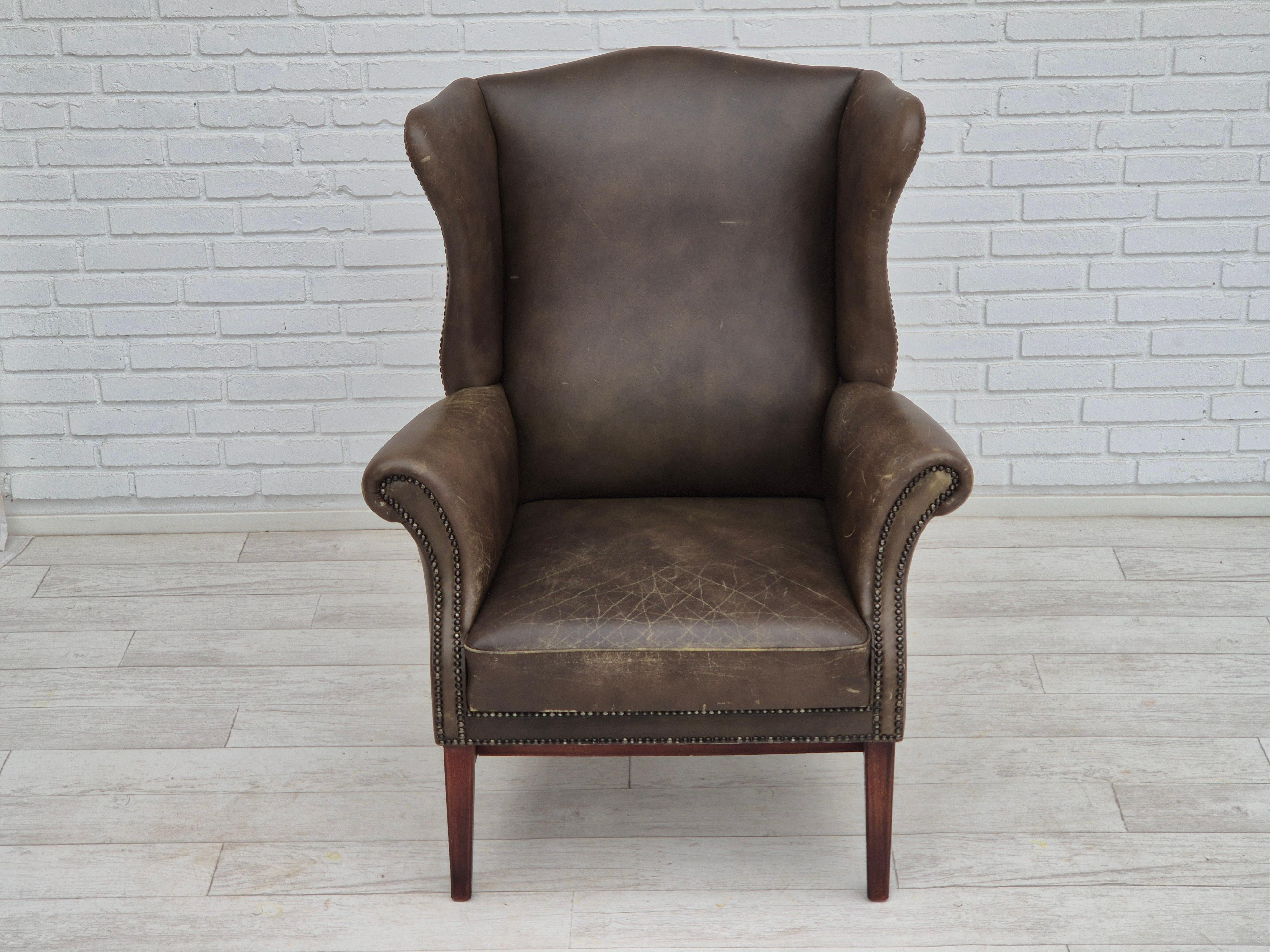 Danish 1970s, Vintage wingback armchair, original condition, leather, beech wood.