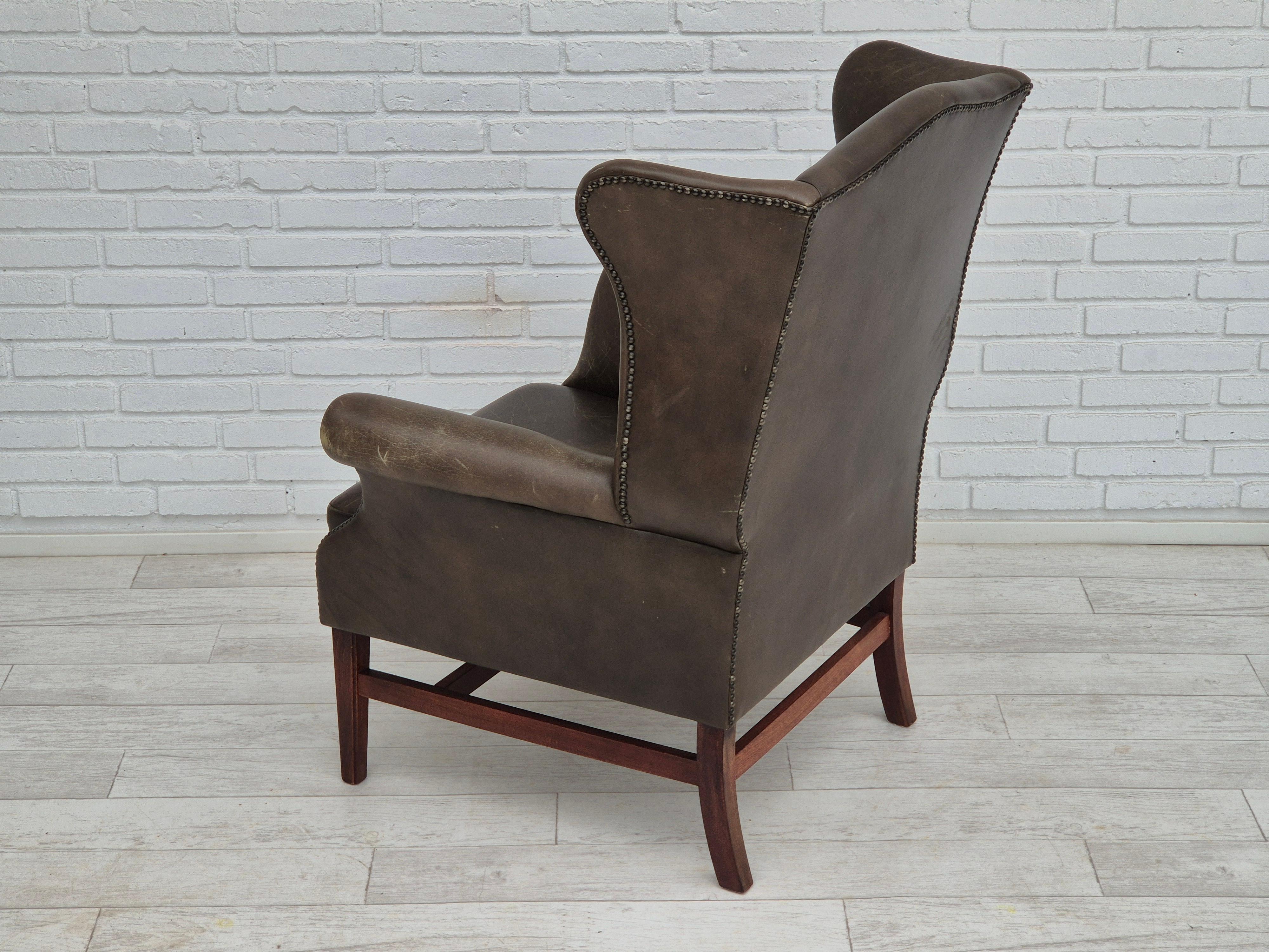 1970s, Vintage wingback armchair, original condition, leather, beech wood. 1