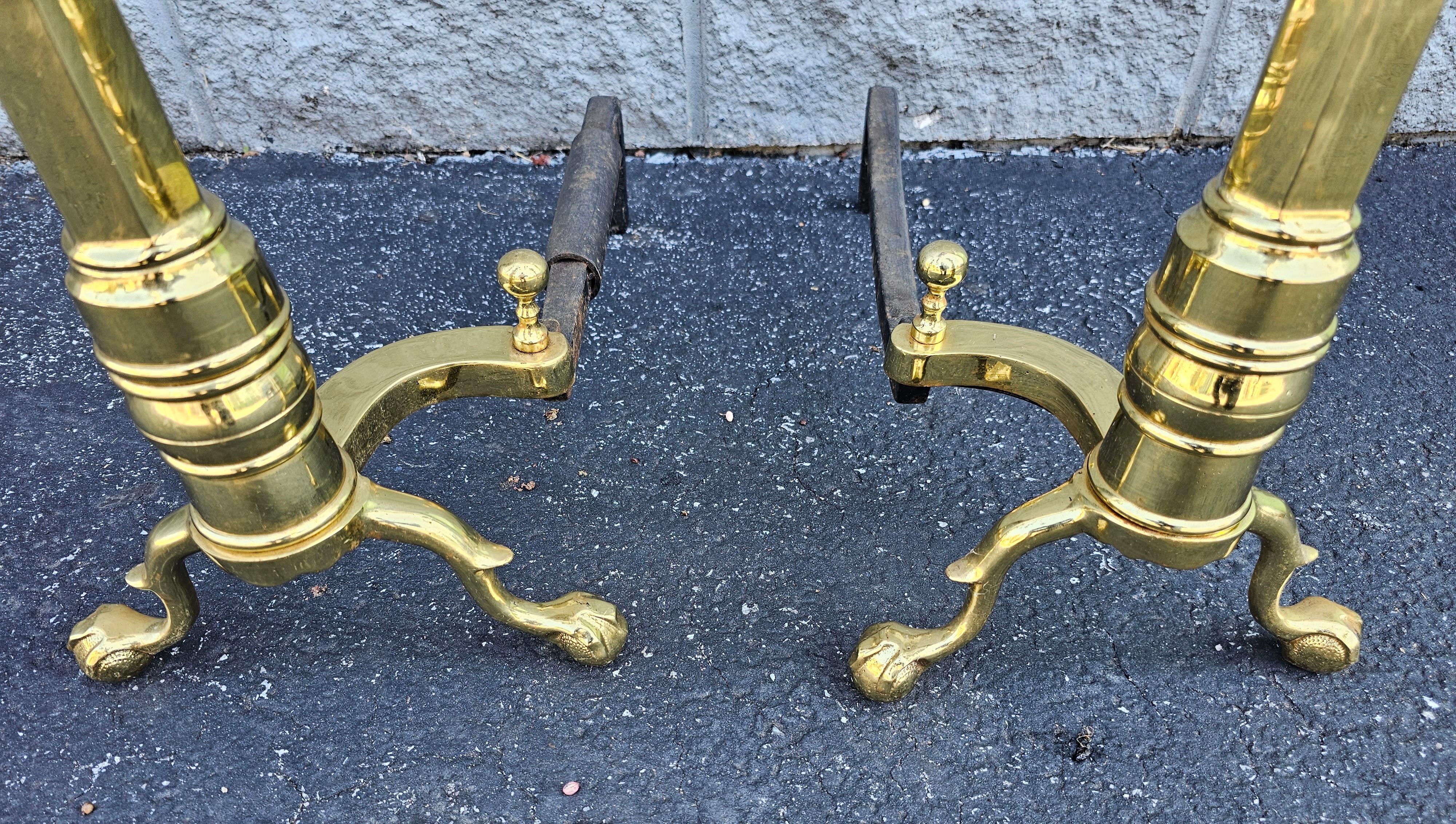 We are offering from a Richmond, Virginia estate a very fine pair of Virginia Metalcrafters (Harvin) brass andirons in the 