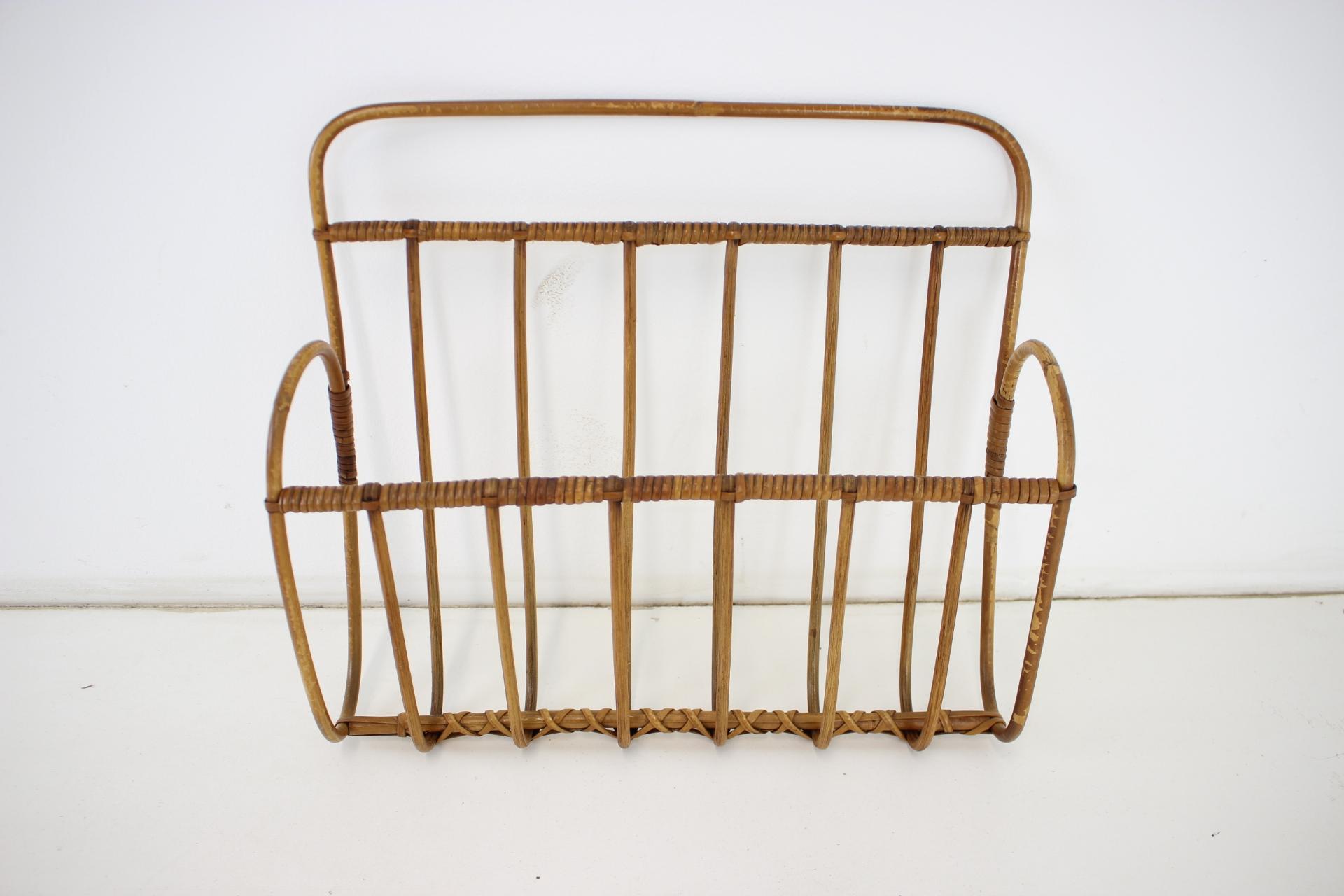 Vintage magazine or newspaper wall holder made of bamboo. Good vintage condition.
