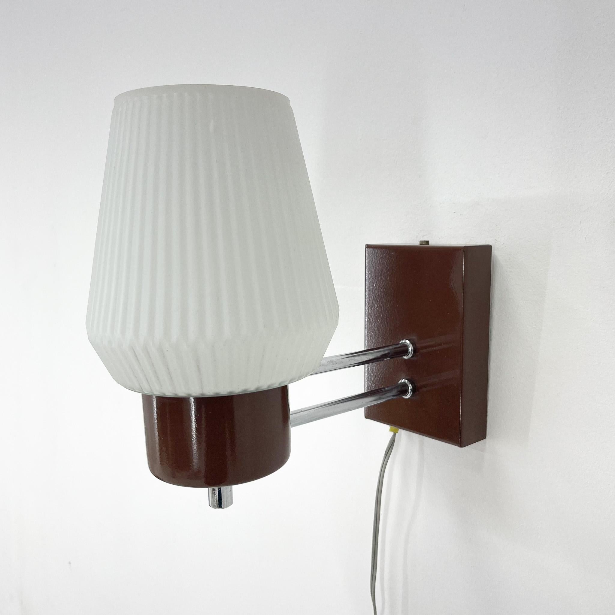 Vintage wall lamp from former Czechoslovakia made of chrome, metal and milk glass. Produced in former Czechoslovakia. Very good vintage condition.