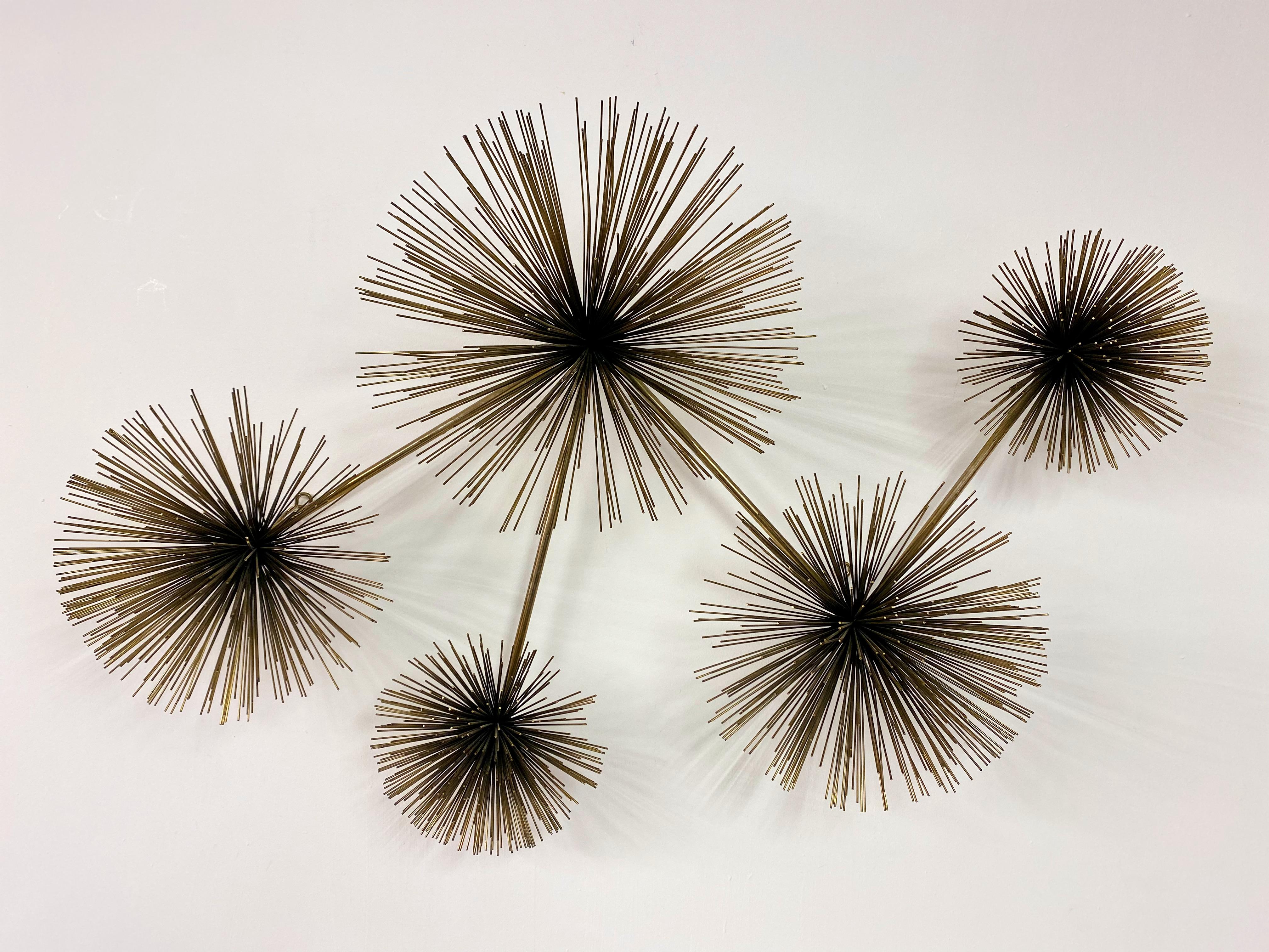 Wall mounted sculpture

By Curtis Jere

Pom-Pom or sea urchin shape

Gold metal

Signed and dated 1979

USA 1979.