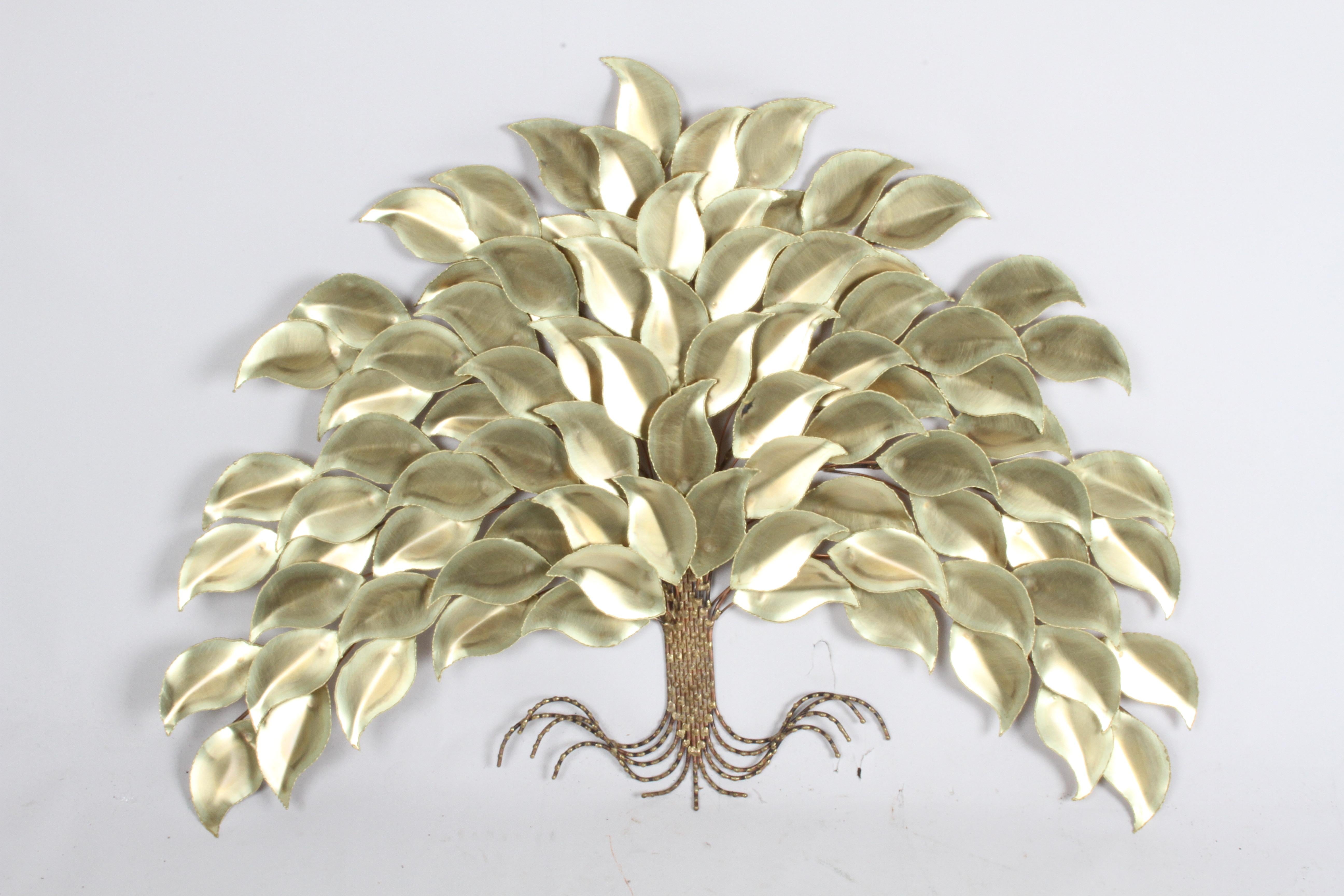 Style of C.Jeré, this 1970s wall sculpture of a tree in bloom with torch cut bright brass leaves & copper rod form trunk. Unsigned, in fantastic condition. 

