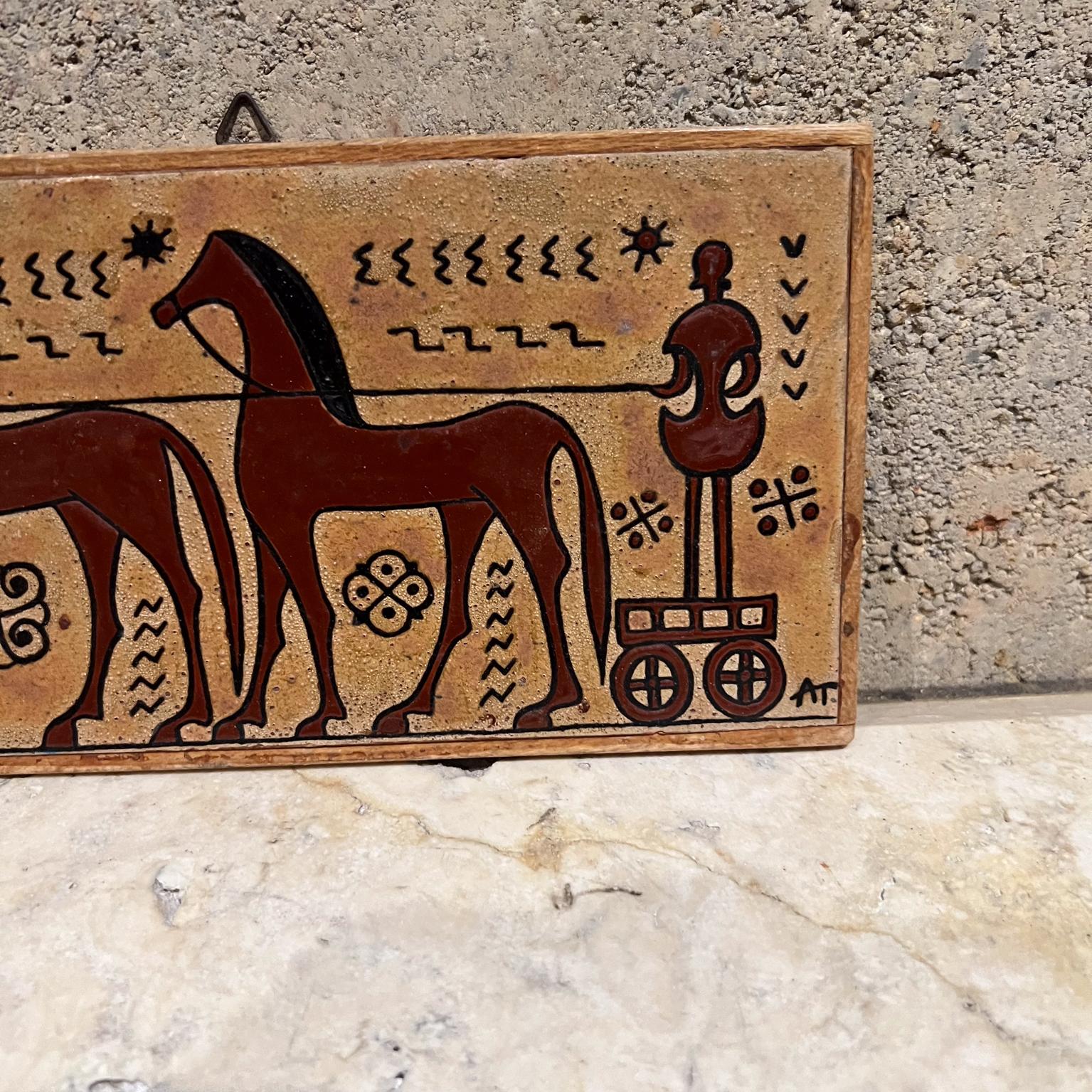 1970s Ceramic Wall Tile Art MCM Terracotta Greek Horse Chariot
Angelos Tsakirakis Greek War Horses Ceramic Art Tile
signed AT
4.25 h x 8.38 w x .5 d
Preowned original vintage
Review all images provided