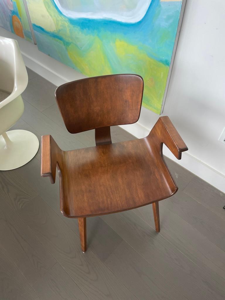 Extremely rare bentwood dining chairs with arms in the style of Thonet in excellent condition. 4 available, selling individually. Minor, unnoticeable nicks from age and use. 