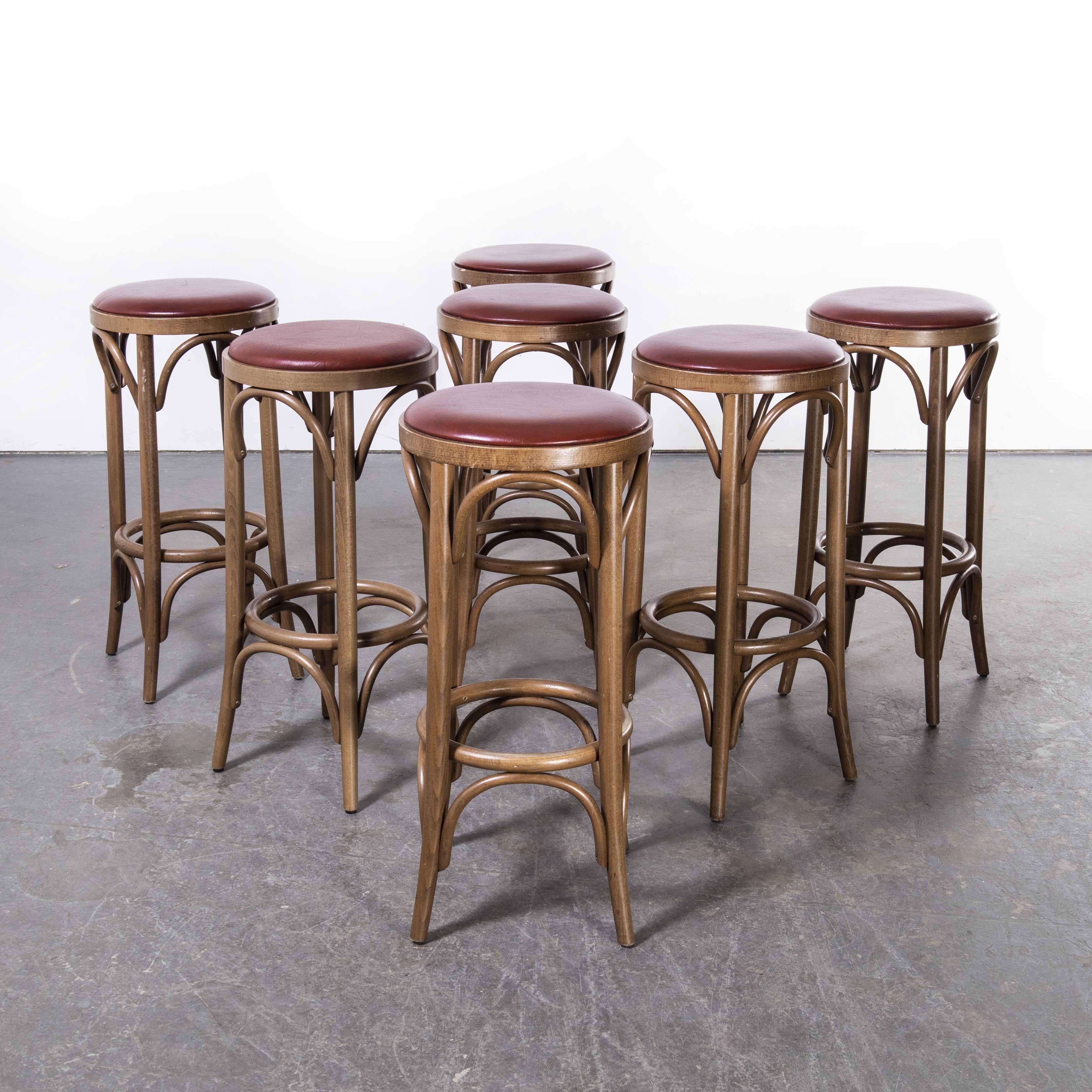 1970’s walnut bentwood upholstered Barstools – set of seven
1970’s walnut bentwood upholstered Barstools – set of seven. These stools were produced by the famous Czech firm Ton, still trading today and producing beautiful furniture, they are an