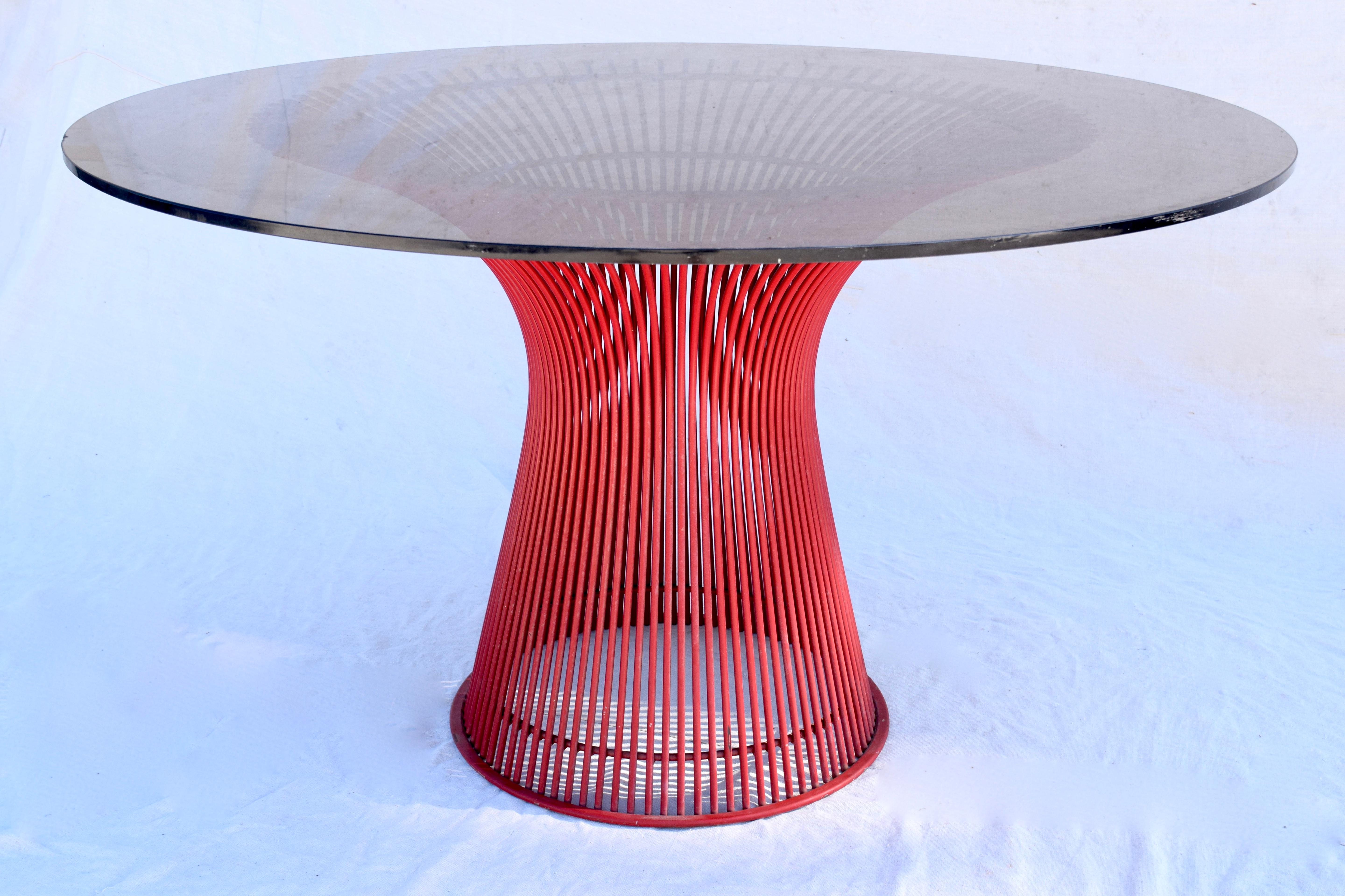 Warren Platner Knoll dining table in red enamel and steel base custom ordered by the original owner in the late 1970s. Unusual original chocolate brown glass top.