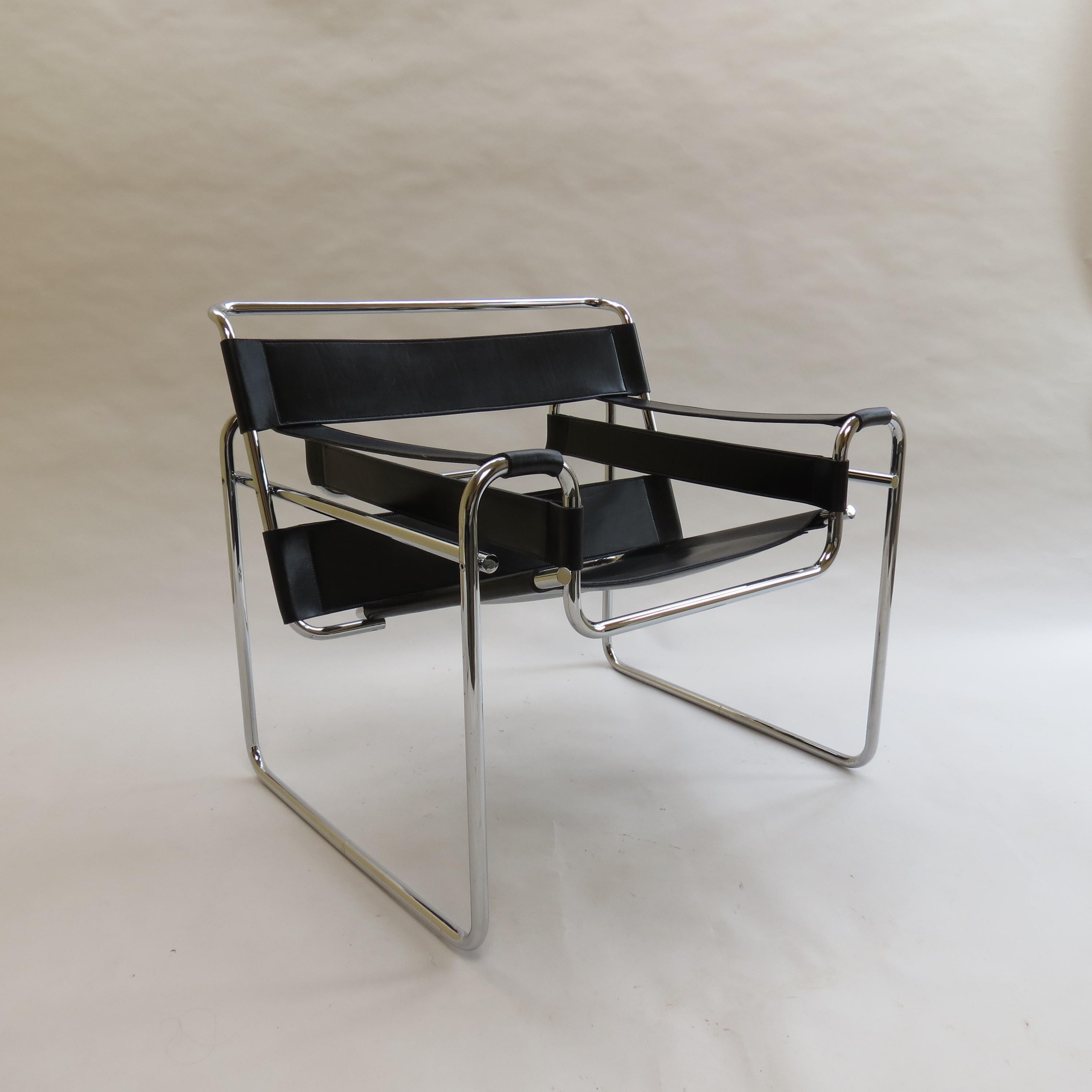 Wassily chair designed by Marcel Breuer and manufactured by Knoll. The original year of design of this chair was 1925, these particular chairs were manufactured in the early 1970s.
Made from polished chrome tube with leather seat and arms. The
