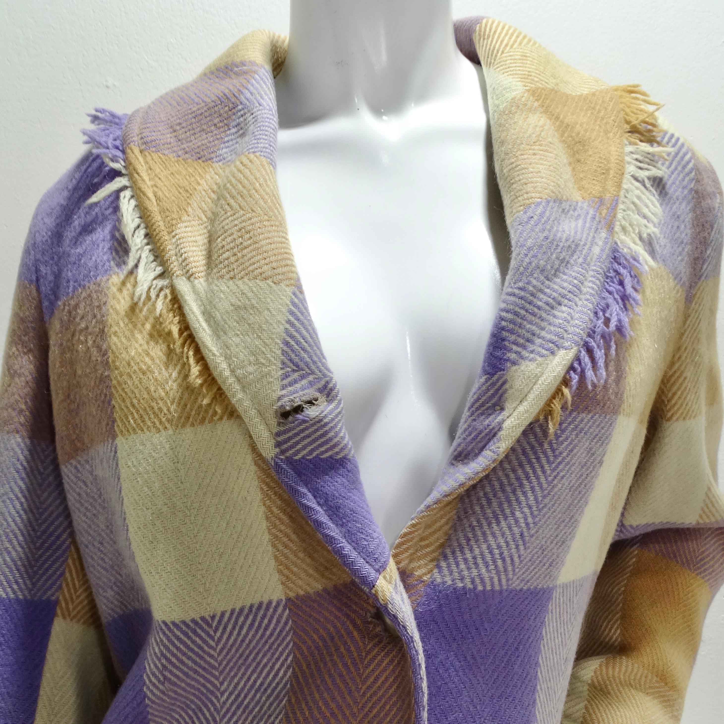 Introducing the 1970s Western Plaid Wool Blazer, a charming piece that captures the essence of 1970s western style with a modern twist. Crafted from luxurious brown and purple plaid wool, this blazer exudes warmth and coziness, making it the perfect