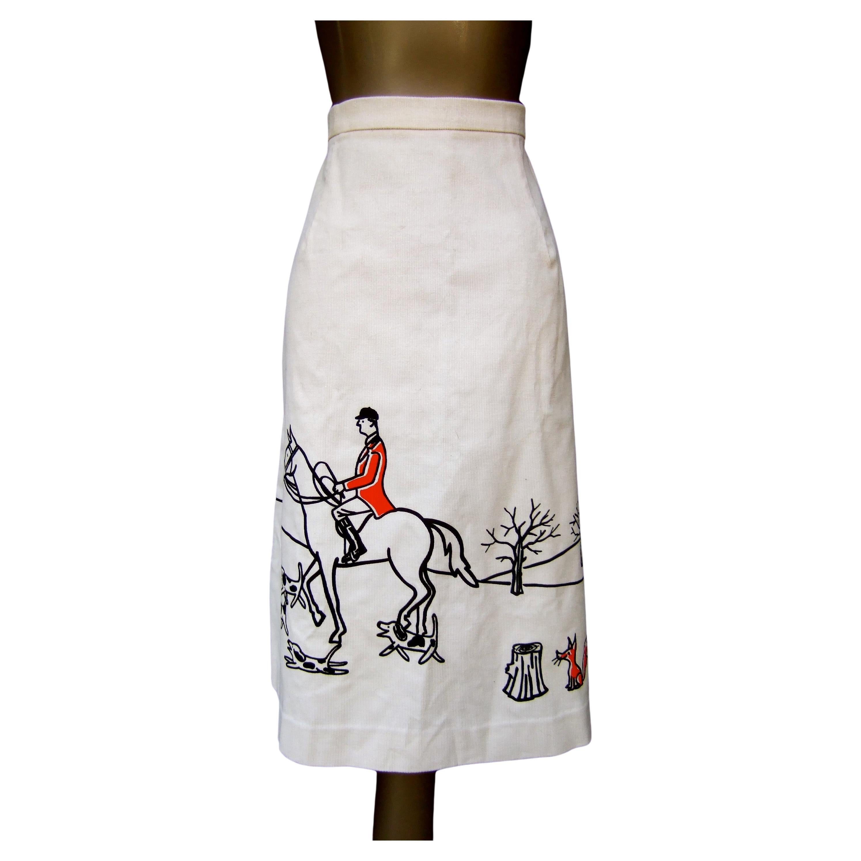 1970s Whimsical fox hunt scene cream corduroy skirt designed by Vested Gentress 
The unique vintage cotton blend light weight corduroy skirt is designed
with a hand screened scene with an English style horseman surrounded 
by his endearing canine