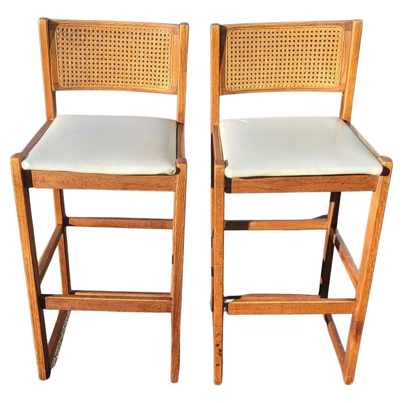 Mid-Century Modern 1970s Whitaker Furniture Oak with Cane Back and Leatherette Seat Bar Stools For Sale