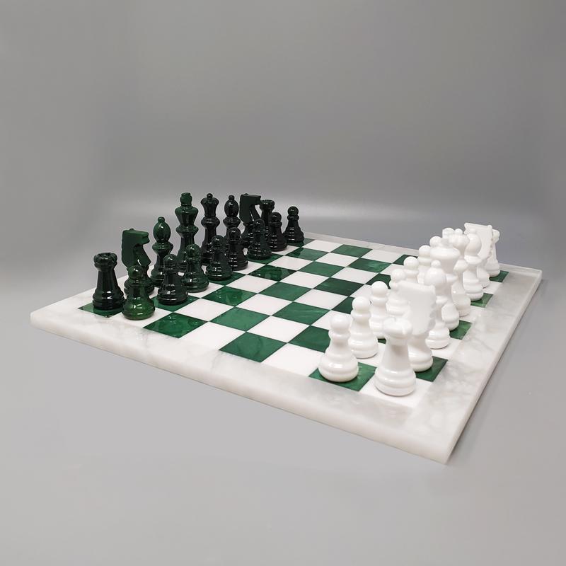 1970s Elegant white and green chess set in Volterra alabaster handmade. Made in Italy, the items are in excellent condition.
This chess set is gorgeous. So rare to find in these colors
Dimensions:
14,56