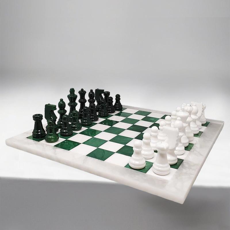 1970s Elegant white and green chess set in Volterra alabaster handmade. Made in Italy, the items are in excellent condition.
This chess set is gorgeous. So rare to find in these colors
Dimensions:
14,56