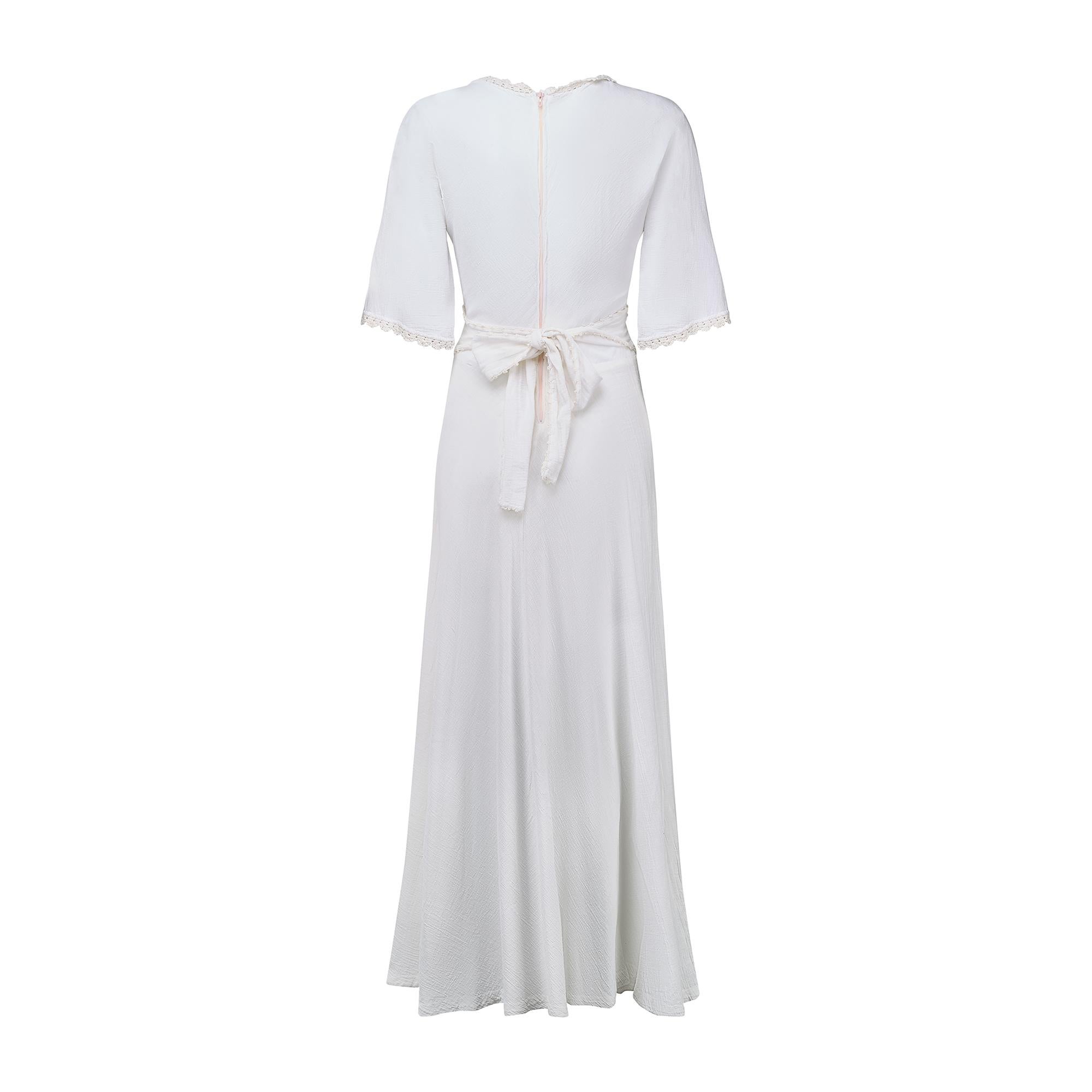 Gray 1970s White Cheesecloth and Crochet Dress with Cross Stitch Applique For Sale