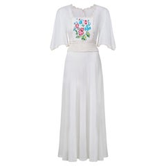 1970s White Cheesecloth and Crochet Dress with Cross Stitch Applique