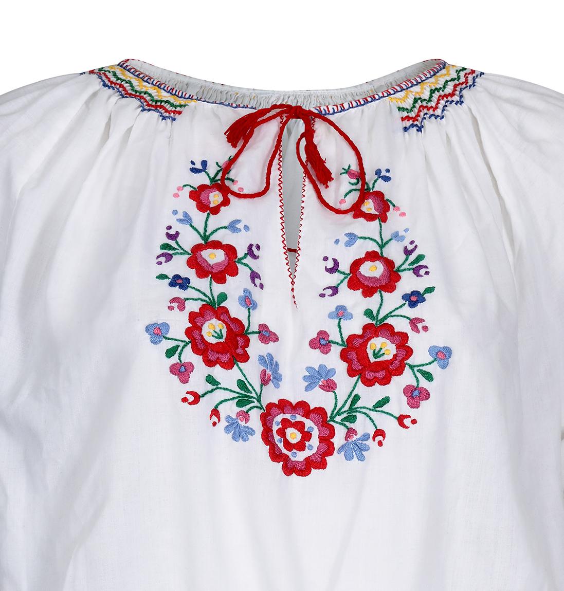 white blouse with embroidery