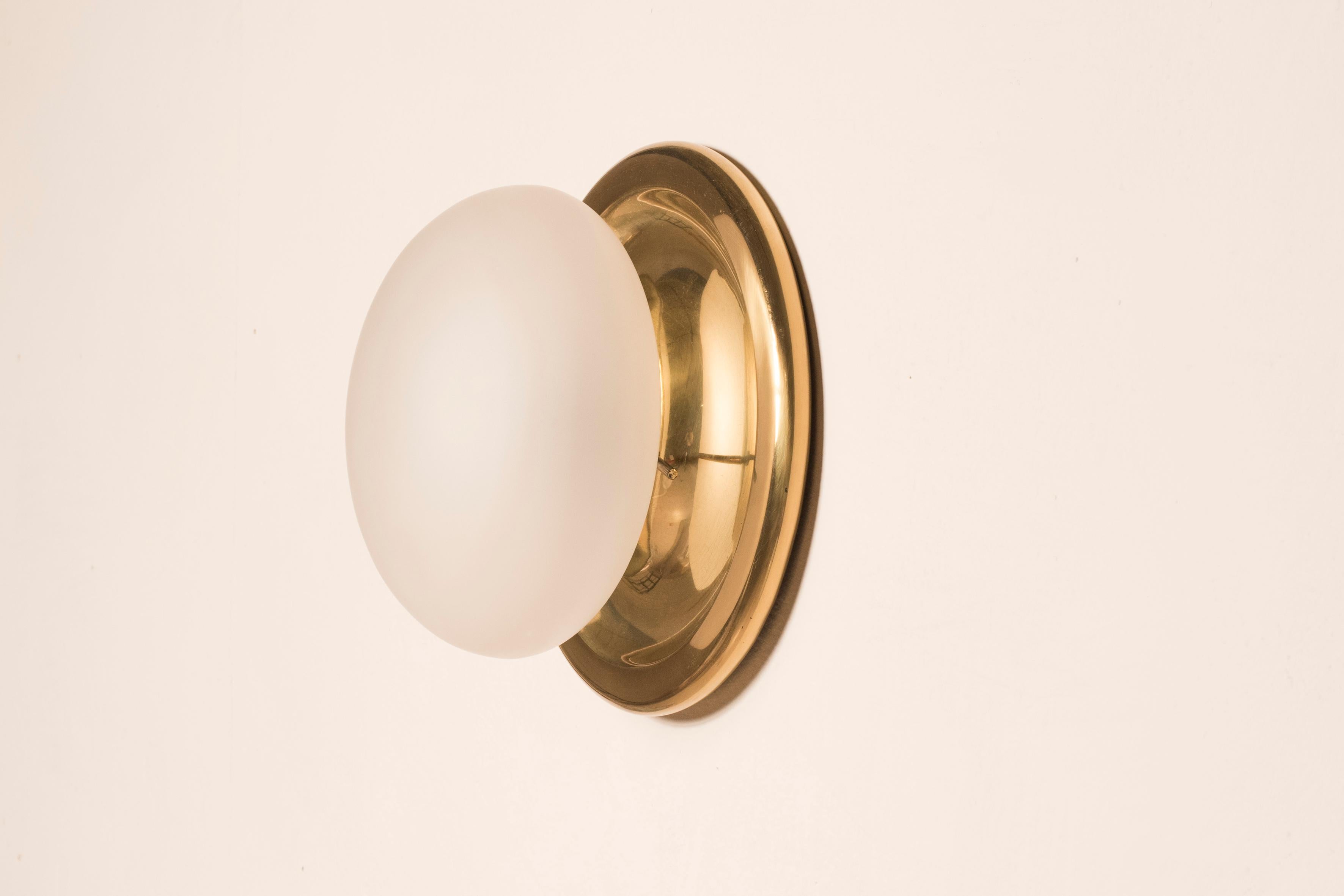 European 1970s White Frosted Glass Wall Lights with brass Base 8 Available