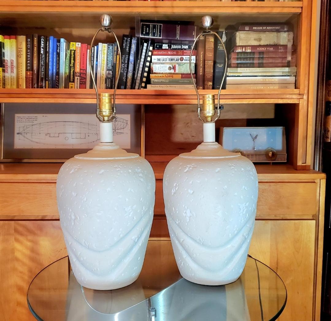 Vintage matching pair of colossal white plaster lamps.
Sculpted.
Post modern.