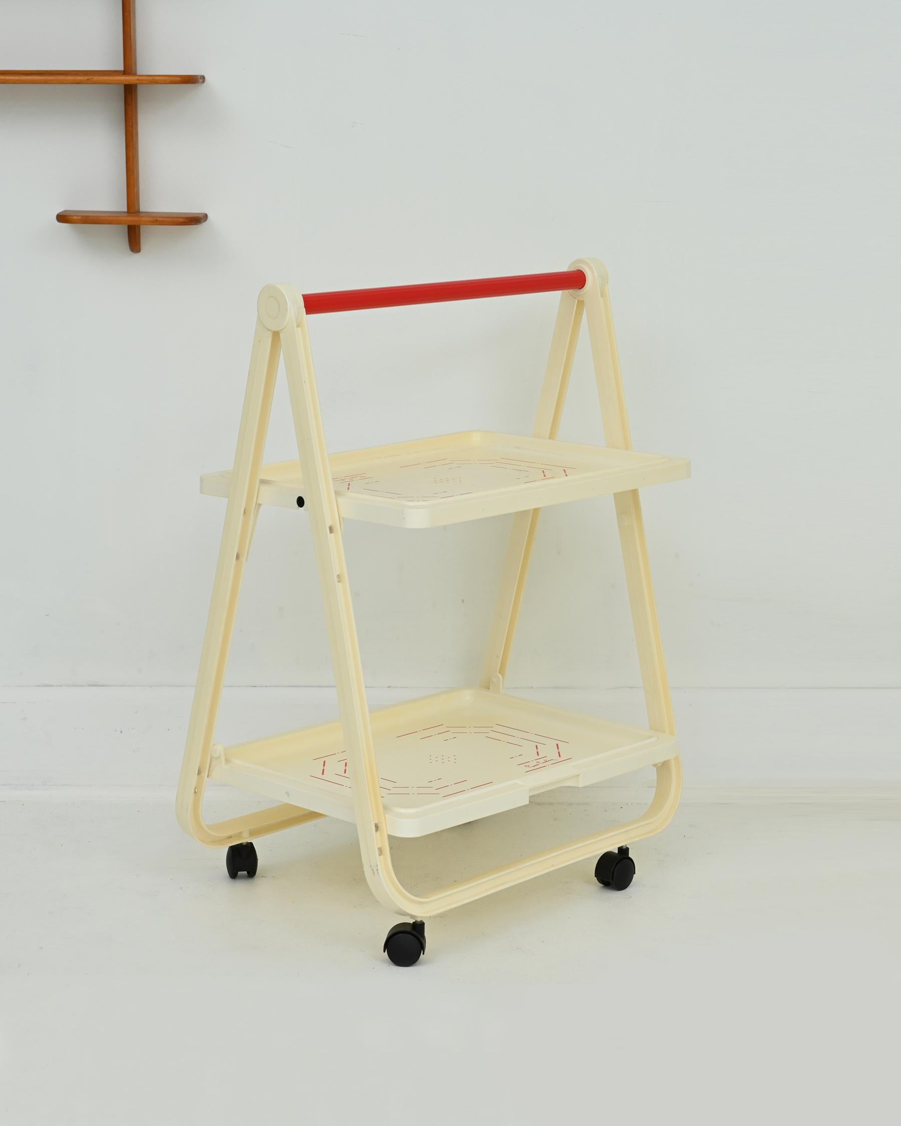 1970s exceedingly rare bar cart designed by Pierre Cardin for Simo. Pierre Cardin maker’s mark throughout. It is versatile and lightweight, yet has a strong plastic construction. Some discoloration spots due to age as shown in photos. Rolls easily