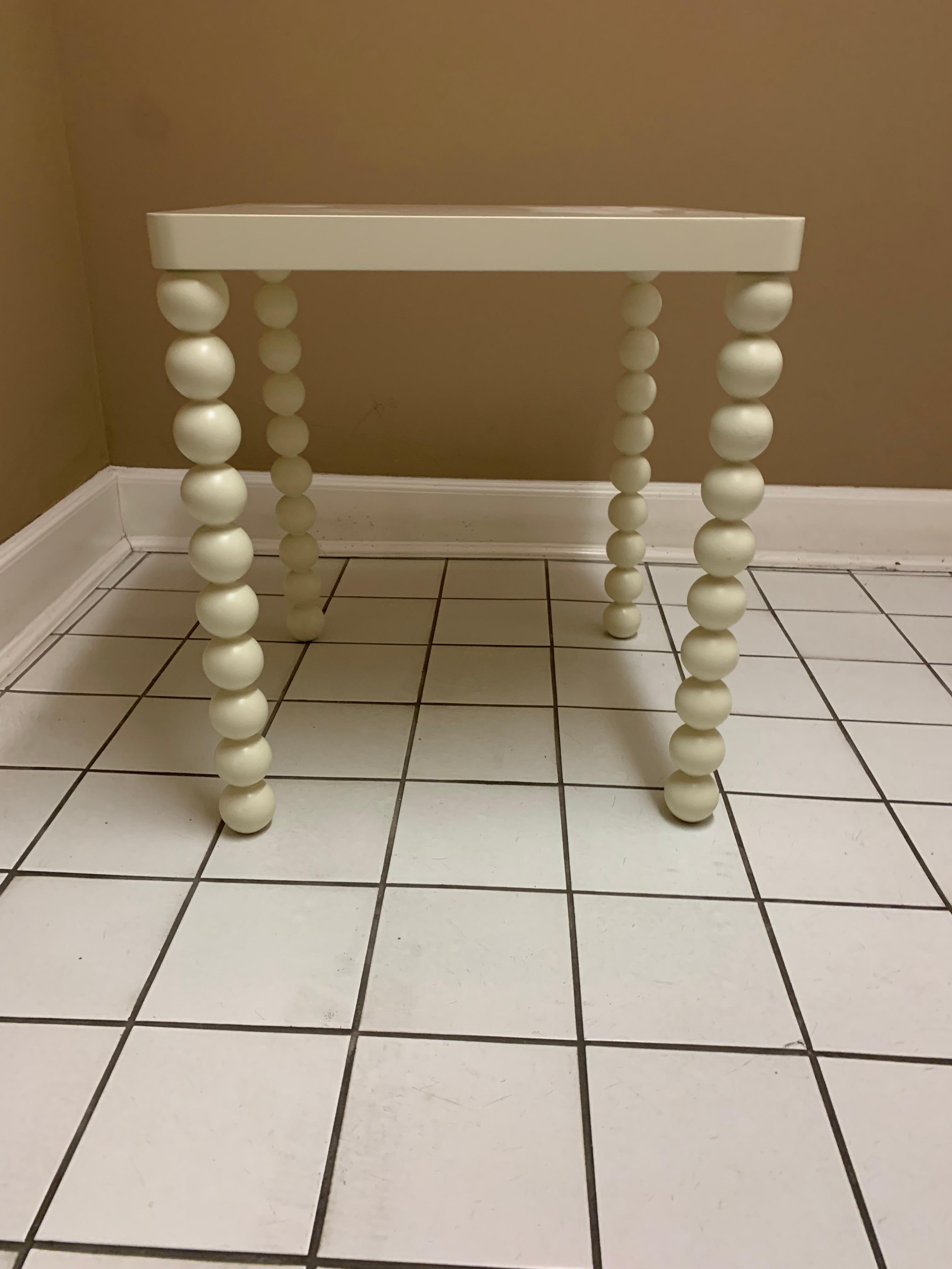 Vintage 1970s off-white wood table with carved rounded legs
perfect for a kitchen table, game table, or in a child's playroom
white hand painted, substantial, and those legs!
Incredibly carved legs make this a one of a kind piece!
Slight chip in