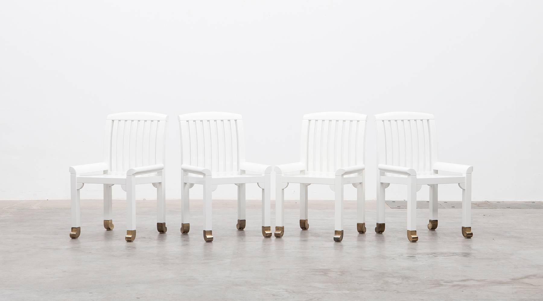 Kerstin Holmquist rare set of six chairs by Nordiska Kompaniets Verkstäder, 1970

The chairs comes in white lacquered wood with beautifully curved small, elegant armrests, which are for use and nice to see. The legs finishes on brass feet, which