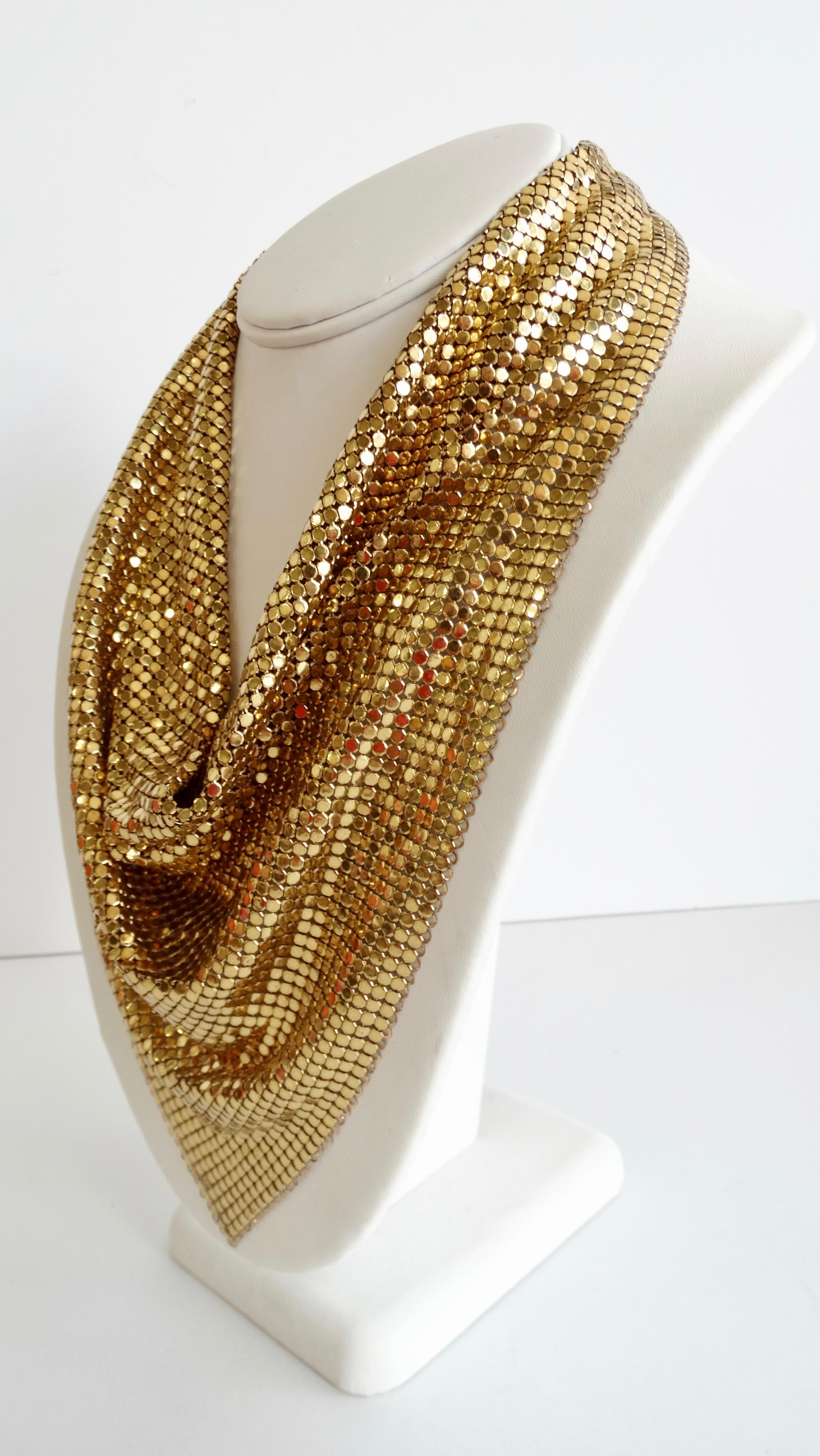 Elevate your holiday looks in our incredible 1970s Whiting & Davis scarf necklace! Made of super fine draped gold metal mesh, gathers elegantly around the neck. Hook and eye clasp for an adjustable fit. Signed Whiting & Davis on the charm at the end