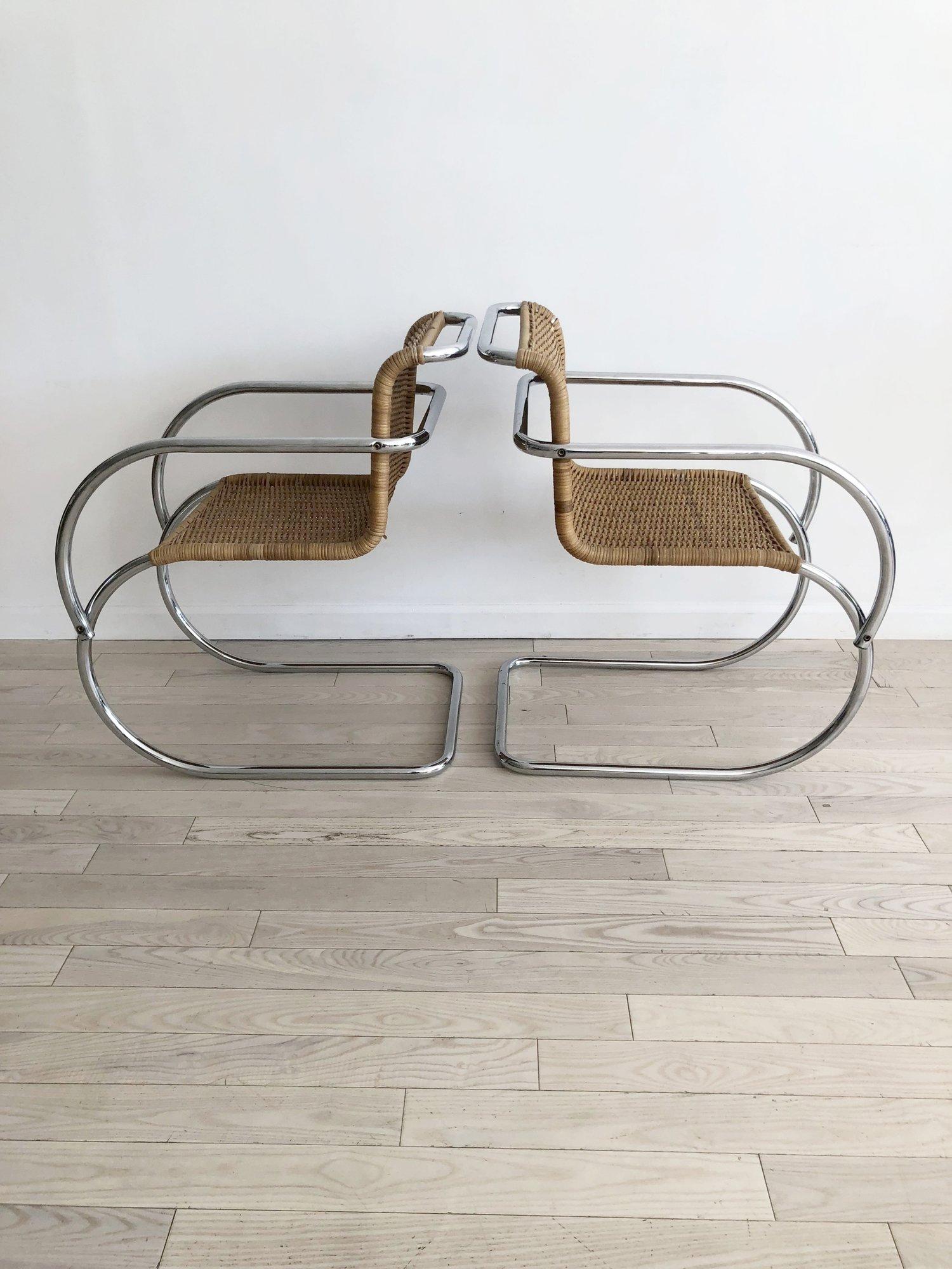 1970s Wicker MR Cantilever armchairs. Pair of vintage 1970s wicker MR chrome cantilever chairs after Mies van der Rohe. Excellent vintage condition. Some minor break in wicker, pictured. Functional and comfortable. Chrome is shinny.