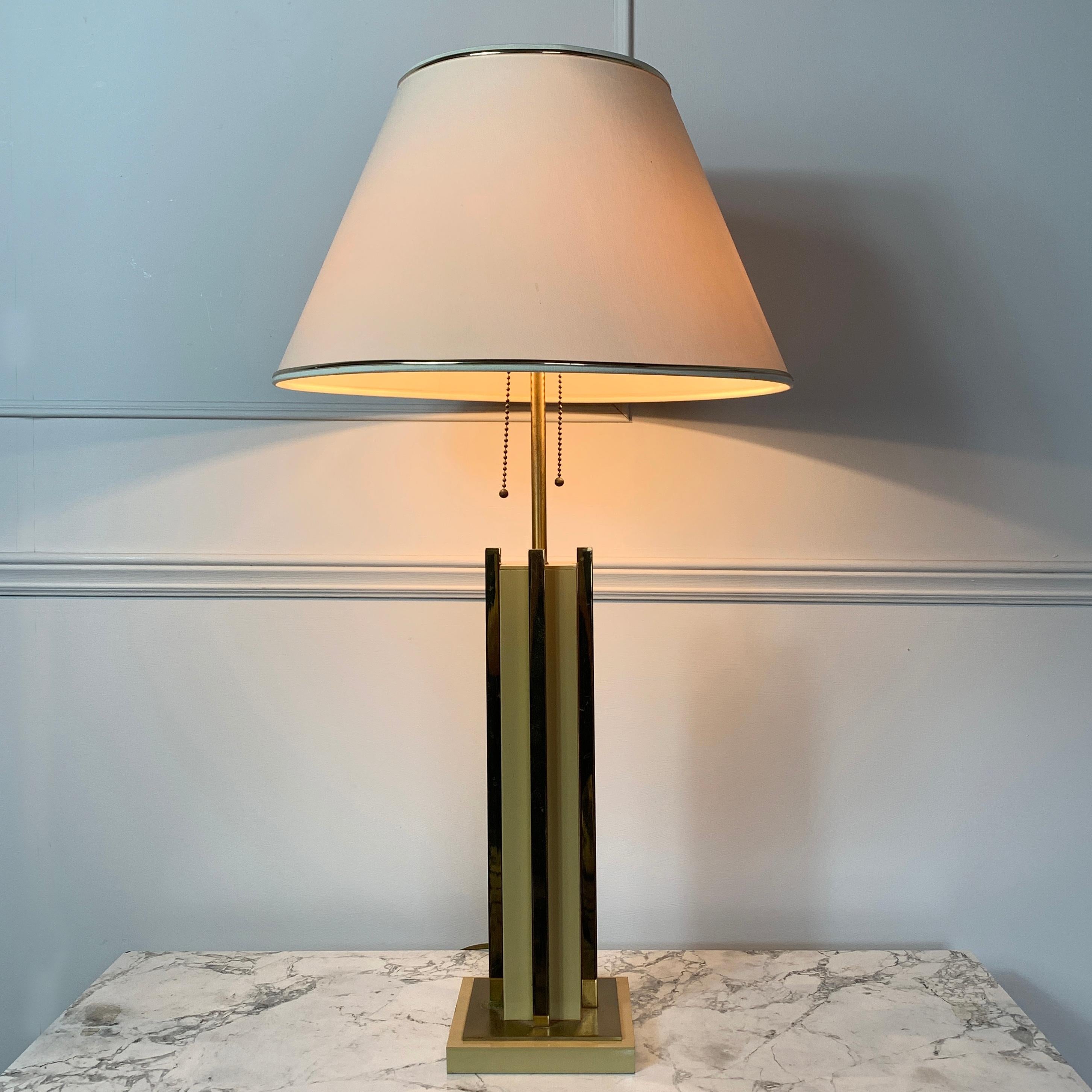 Willy Rizzo attributed table lamp, 1970s, Italy
The lamp has 2 E27 screw in bulb holders each with pull chain on/off independently
Soft caramel and brass
This is a heavy, quality lamp
75cm height, 14cm base width, shade 40cm width
Some areas of