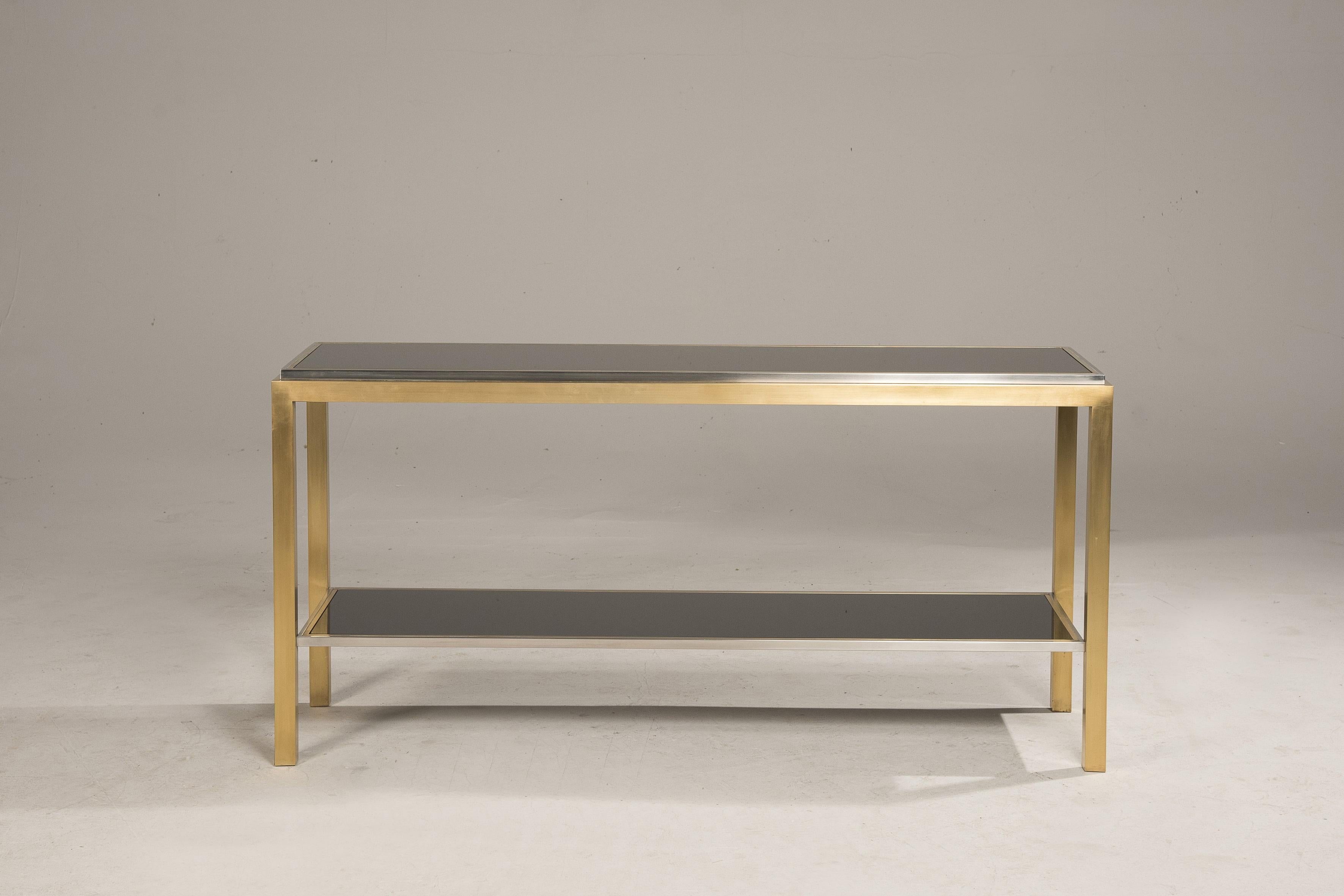 Brass and steel table console from 1970s from Italy, attributed to Willy Rizzo school.
Two smoked glasses shelves 
Very good conditions.
 Size 160x 50 h 79 cm 