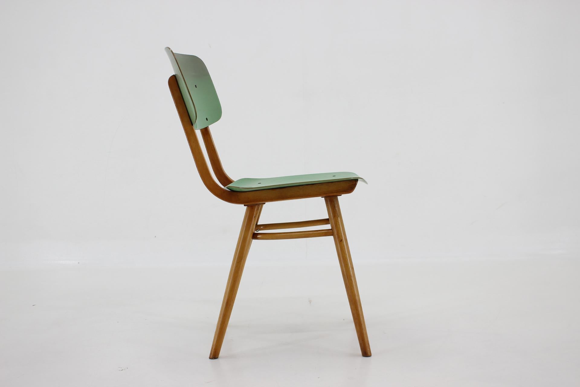 Vintage single chair made of wood and formica. Wooden parts were carefully refurbished.