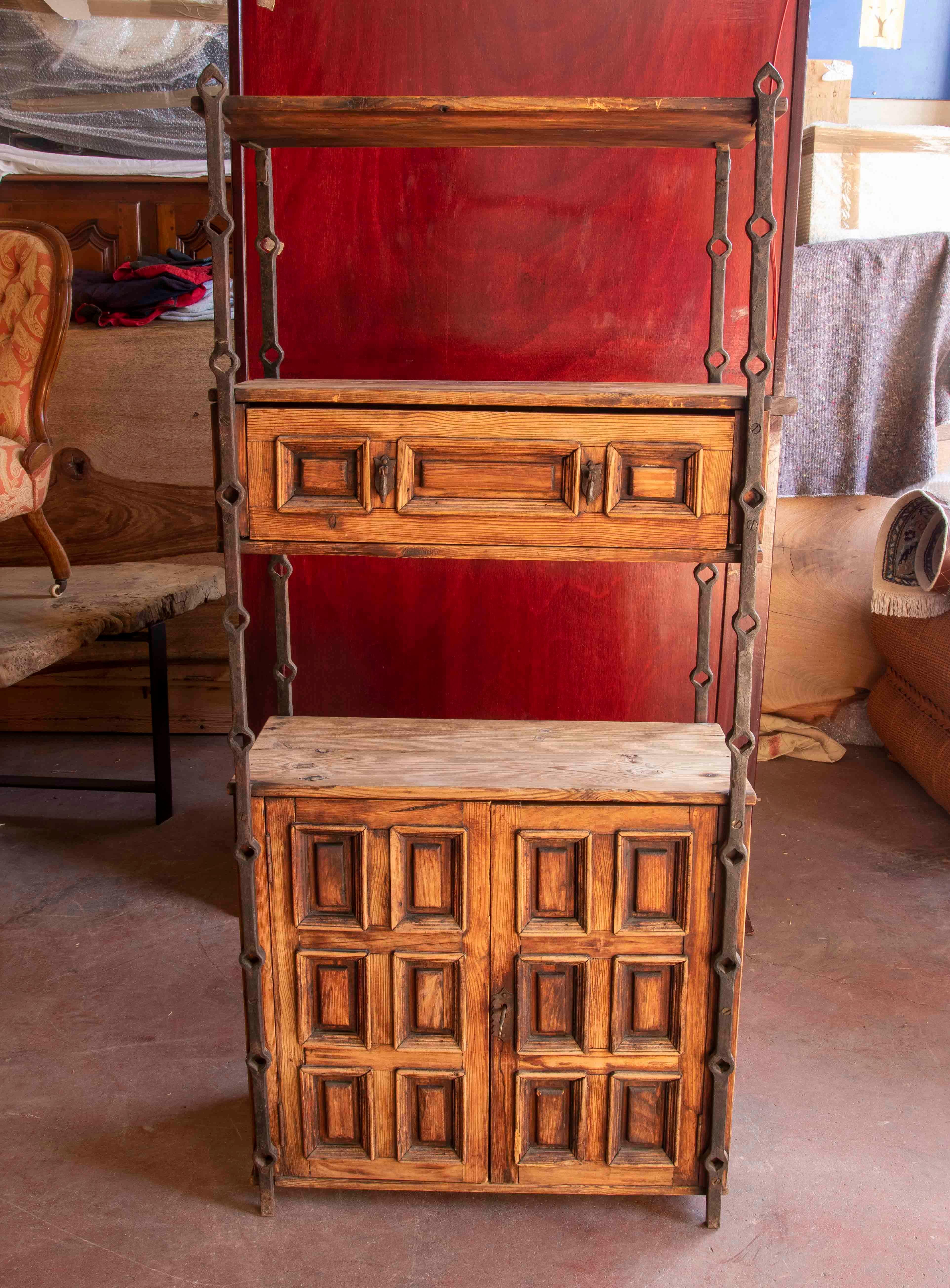 Spanish 1970s Wooden Bookshelf with Paneling and Iron Decoration  For Sale