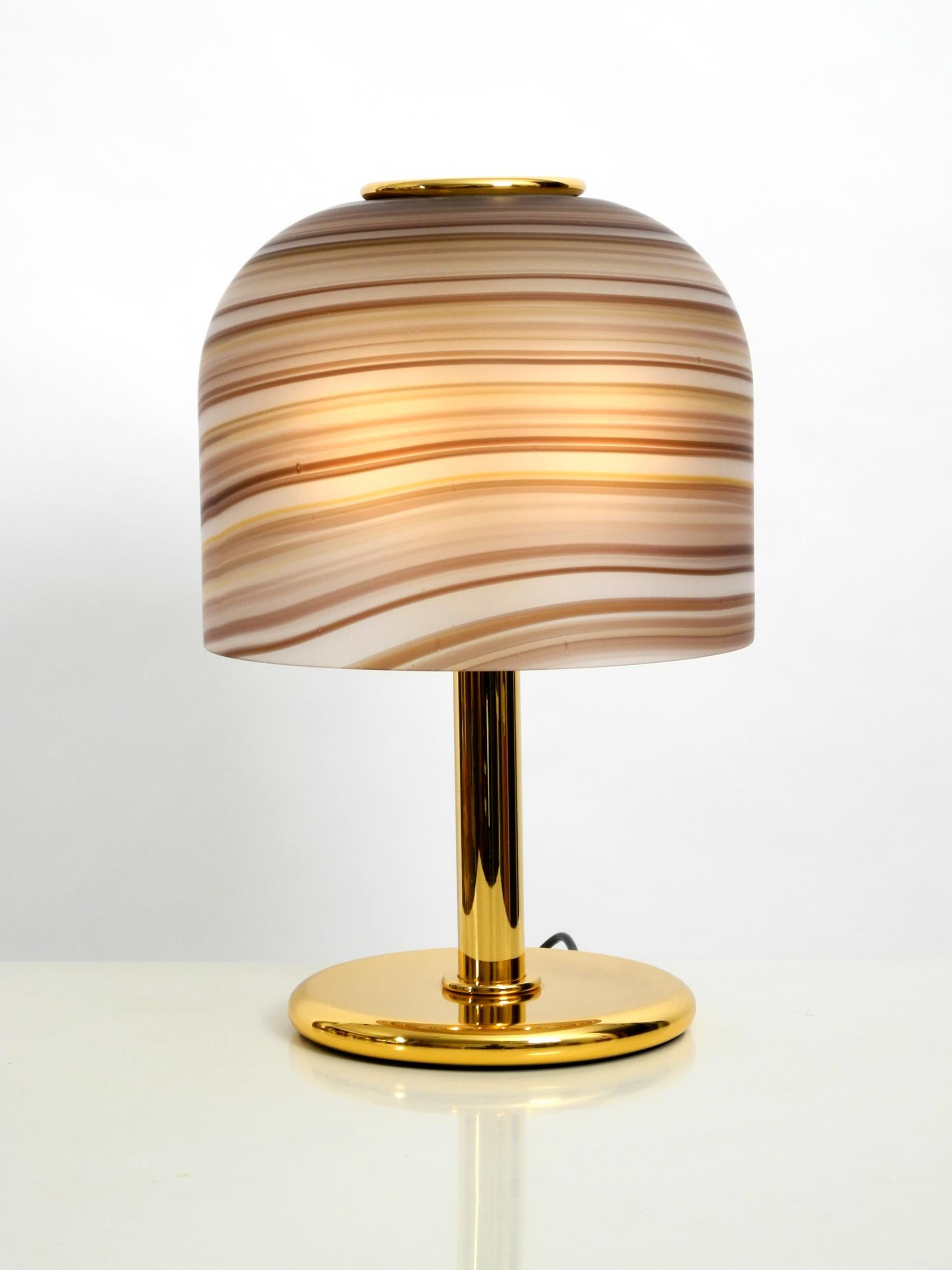 Gorgeous 1970s XL italian table lamp. Very heavy brass base with very high quality glass shade with brown shaded stripes. Very elegant seventies design in good vintage condition. Pleasant, warm, glare-free light. Two original E27 sockets. No damages
