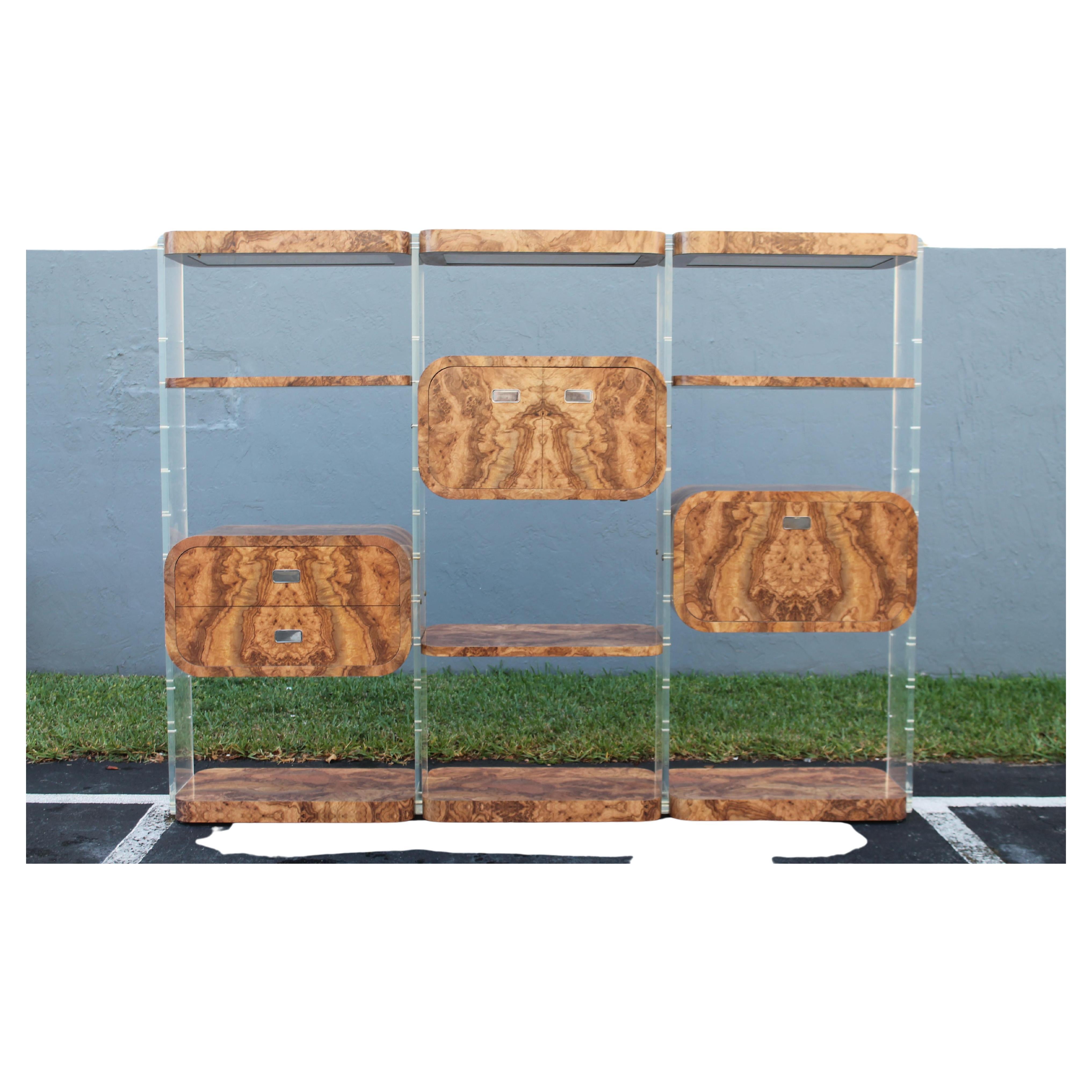 1970's XL Lucite with Melamine Room Divider/ Screen/ Wall Unit. Compartmentaized with faux exotic wood detail. Dry bar / desk/ adjustable shelves. Top hidden lighting. Chrome handles. Palm Beach Estate acquisition. Disassembles for shipping and this