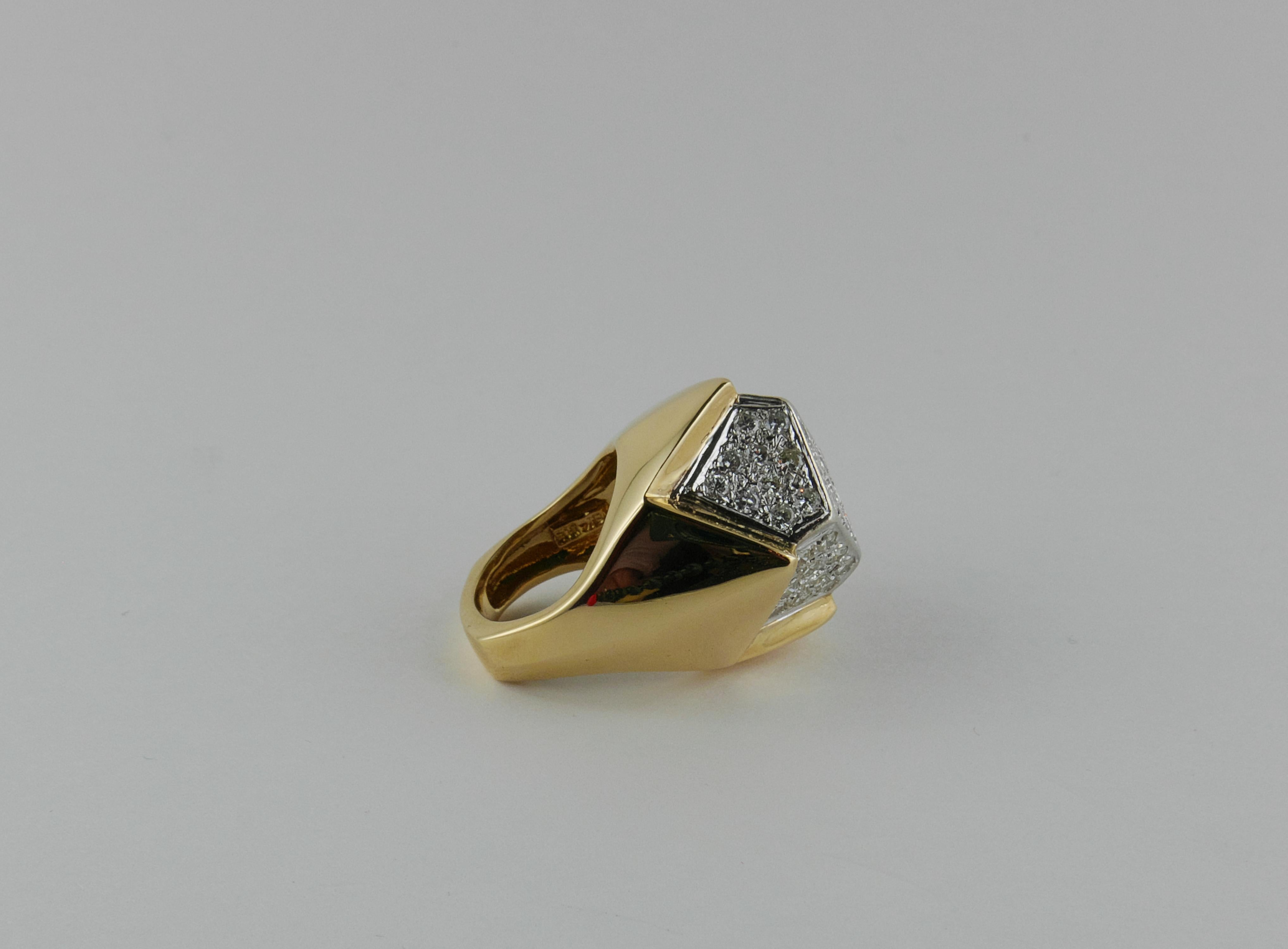 Sleek and intriguing 1970s geometric Ring finely crafted in rich 18 karat Gold and  brilliant cut Diamonds set in Platinum.
This stylish and always modern Ring is in Yellow Gold, formed of a geometrical crown shape setting adorned on its top with an