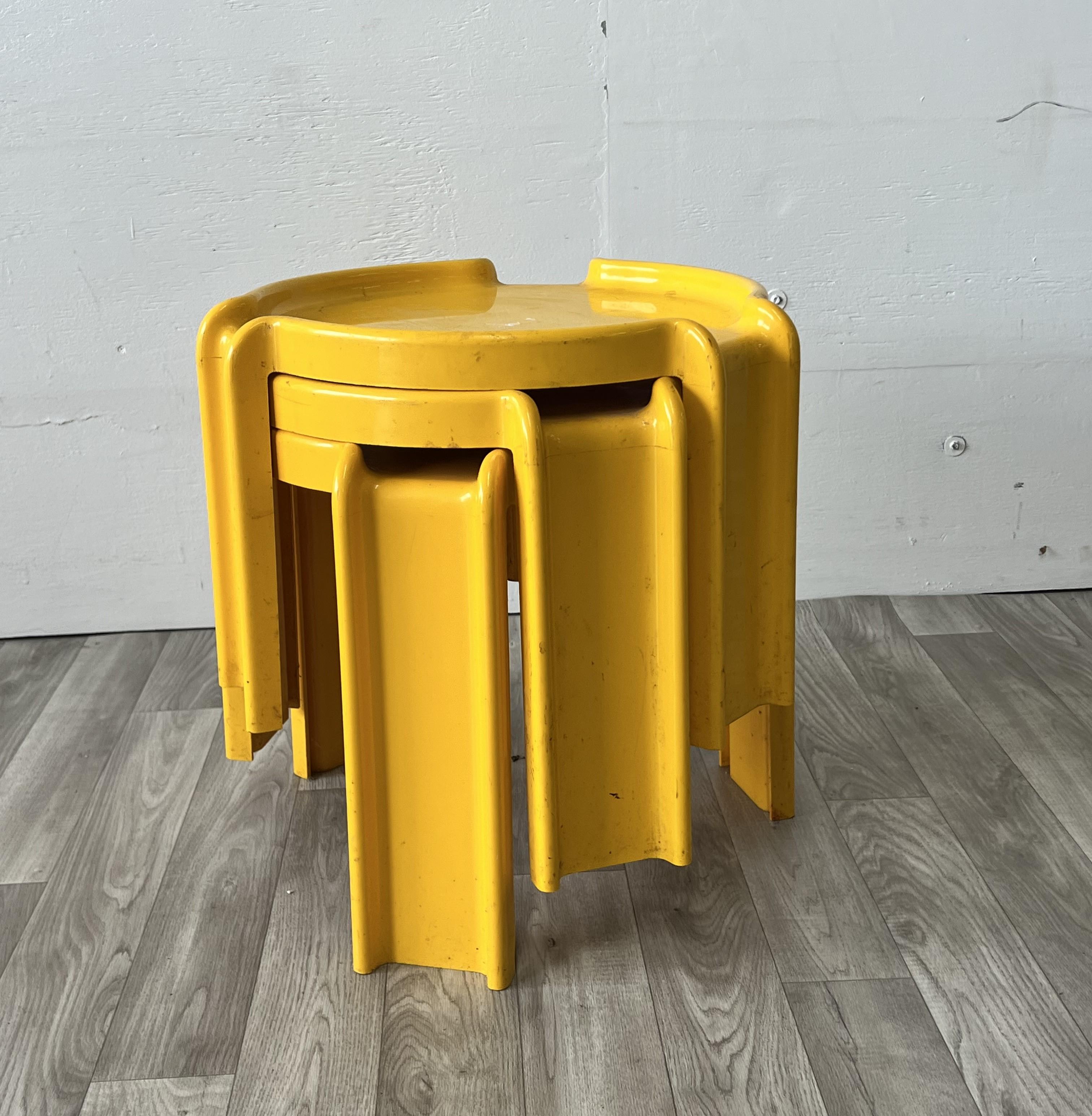 Designed by Giotto Stoppinto for Kartell
Set of 3 plastic yellow stacking tables
Vintage condition with slight signs of use