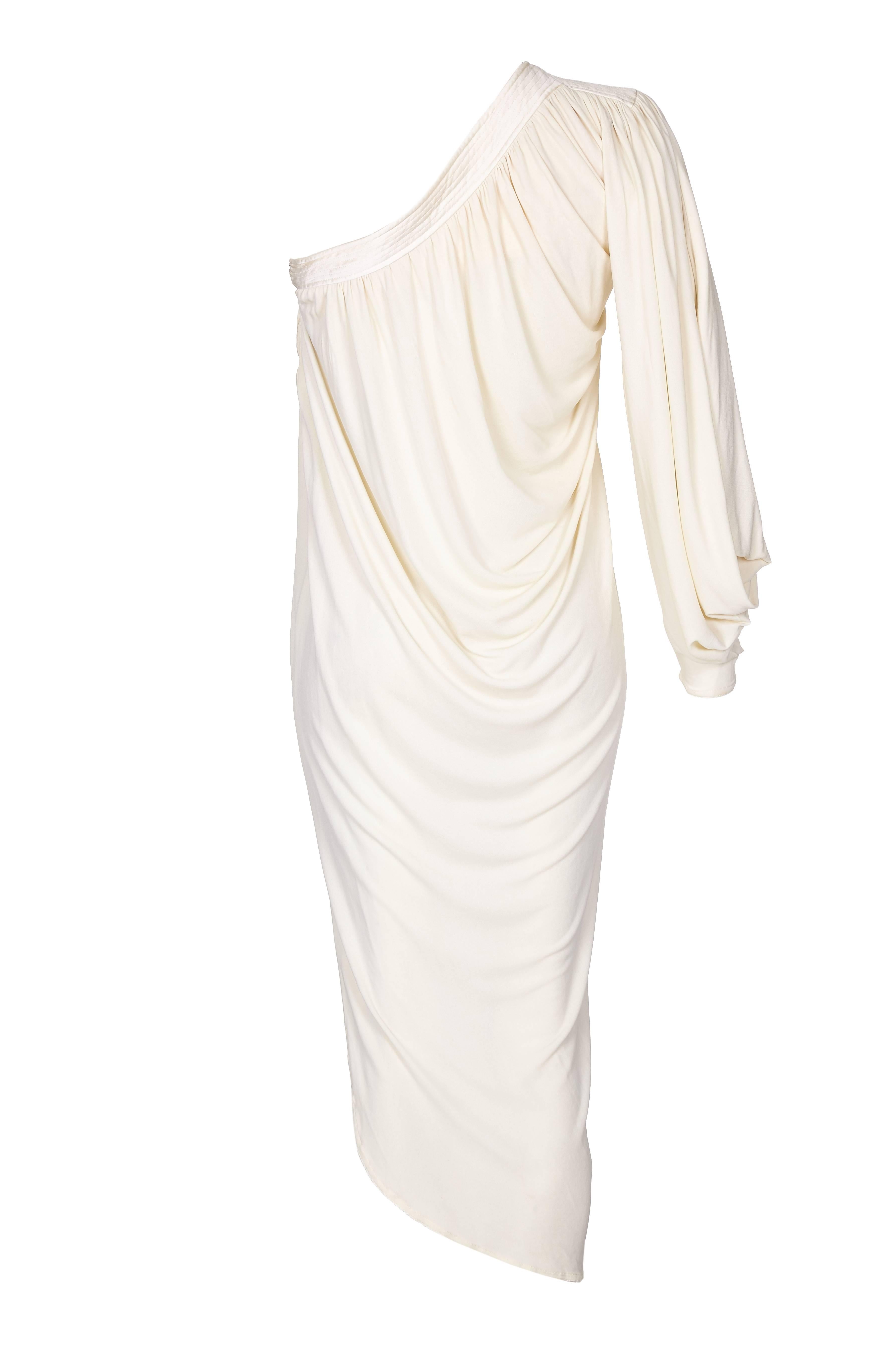 1970s Yuki couture asymmetrical dress in cream silk/jersey. Draped in a Grecian style, this dress is really special and would be perfect for any occasion. This is a piece from his main line collection not his later diffusion line for Rembrandt.